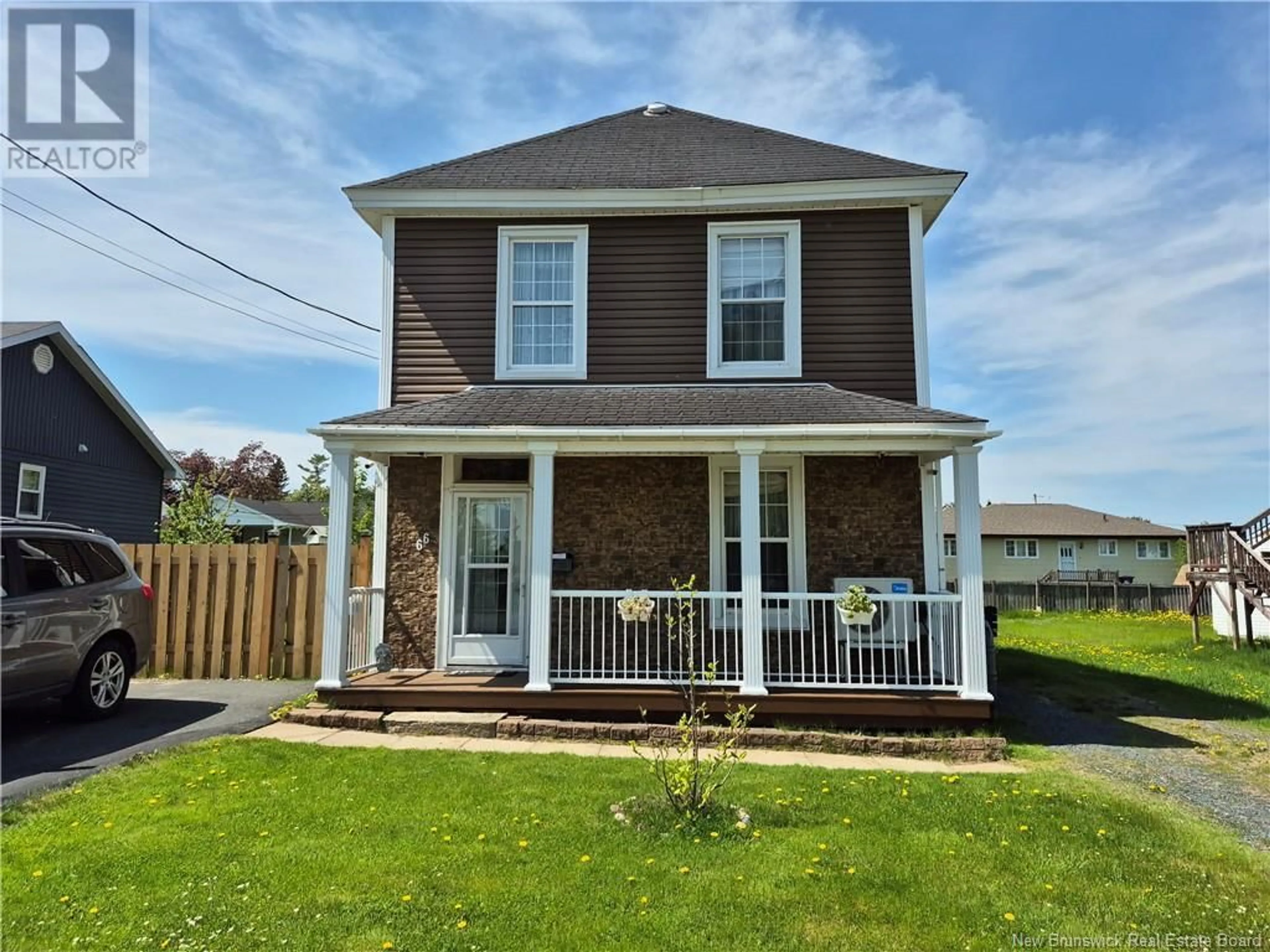 Home with vinyl exterior material, street for 66 JOHN STREET, Miramichi New Brunswick E1N2X5
