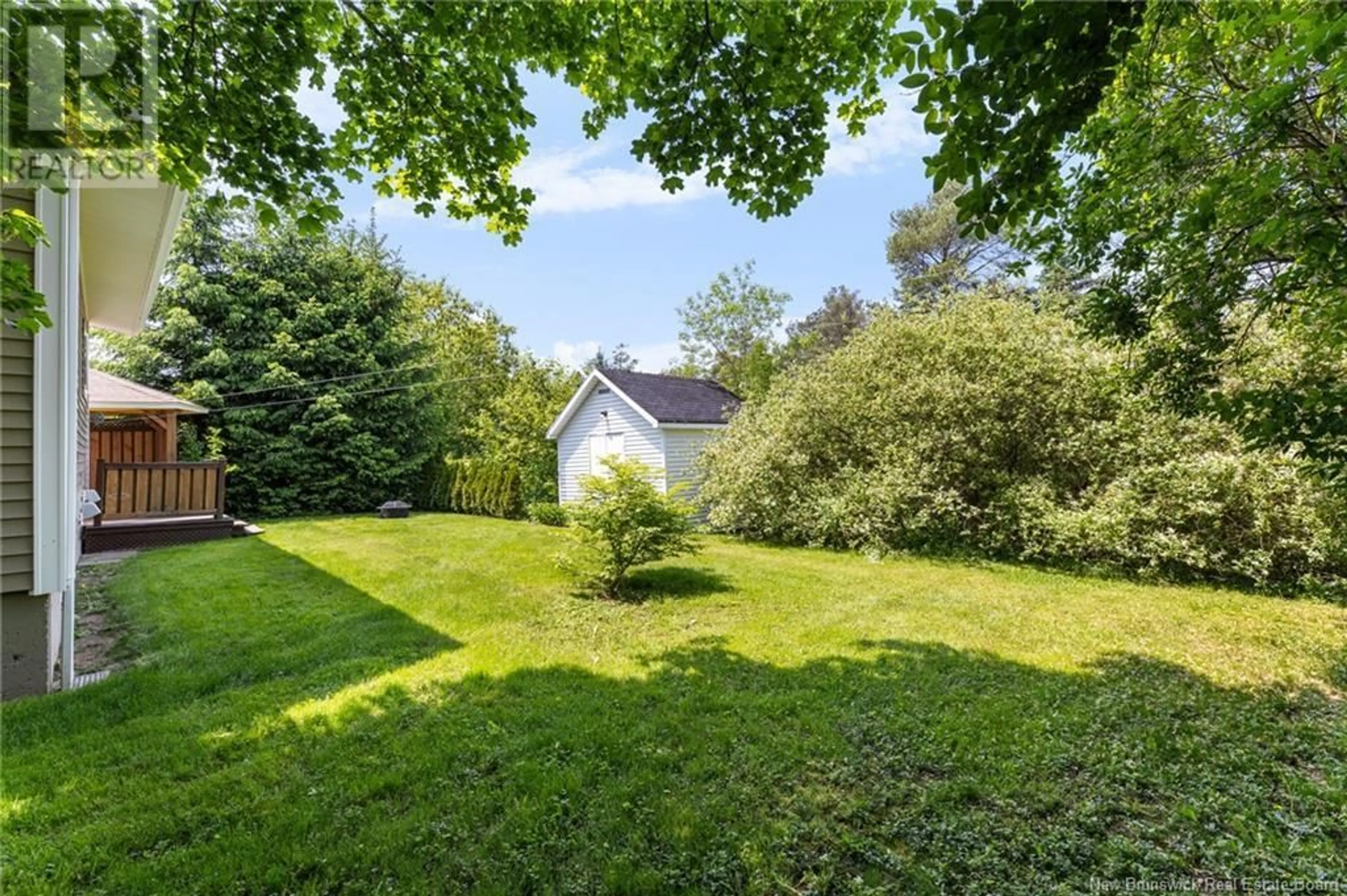 A pic from outside/outdoor area/front of a property/back of a property/a pic from drone, forest/trees view for 103 GLENWOOD, Moncton New Brunswick E1A2M8