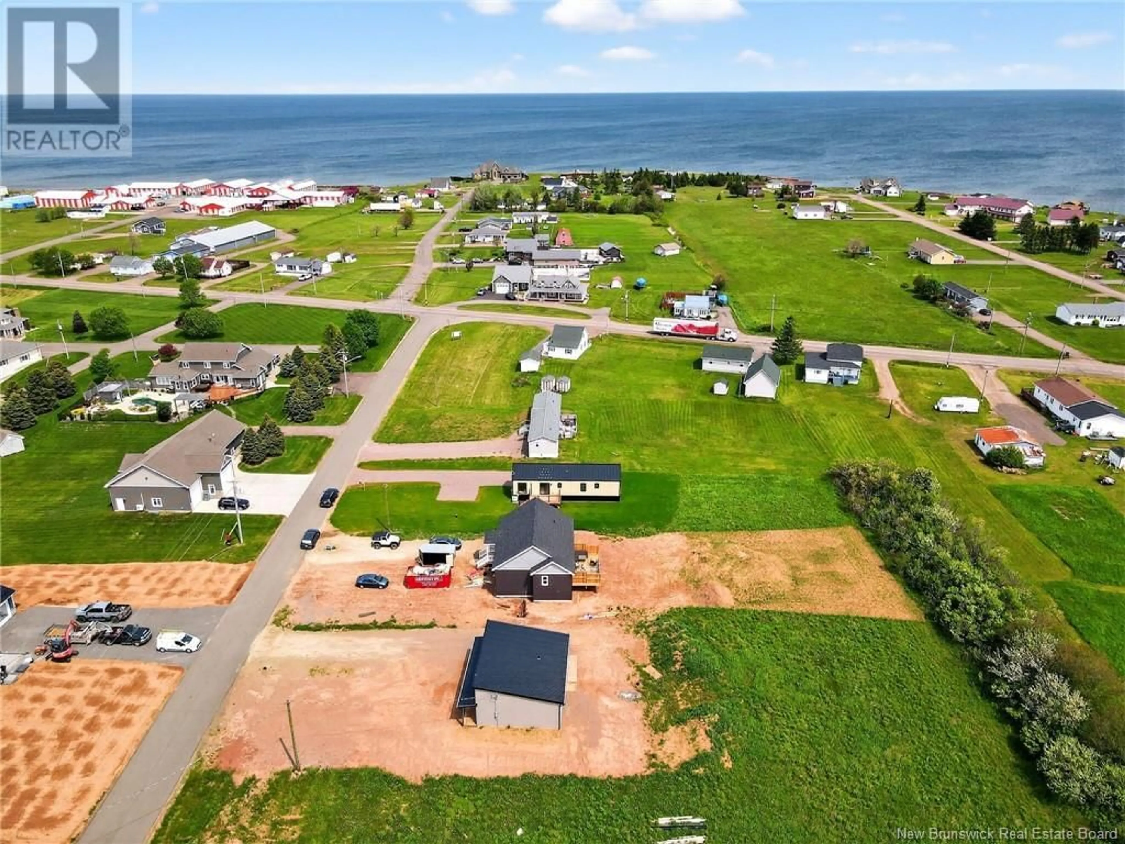A pic from outside/outdoor area/front of a property/back of a property/a pic from drone, water/lake/river/ocean view for 22 BEDECHE STREET, Cap-Pelé New Brunswick E4N0G1