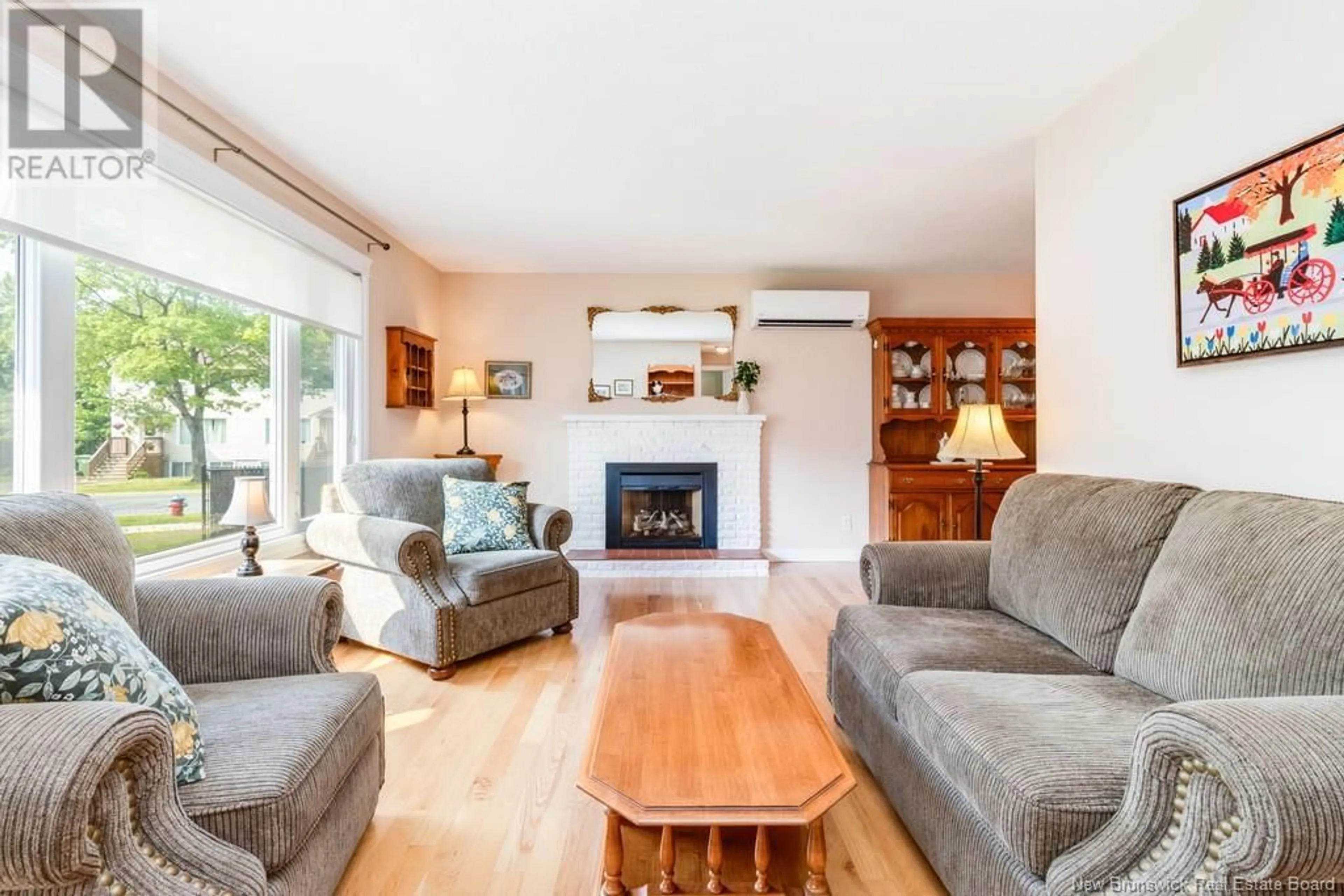 Living room with furniture, wood/laminate floor for 259 TOPCLIFFE CRESCENT, Fredericton New Brunswick E3B4P8