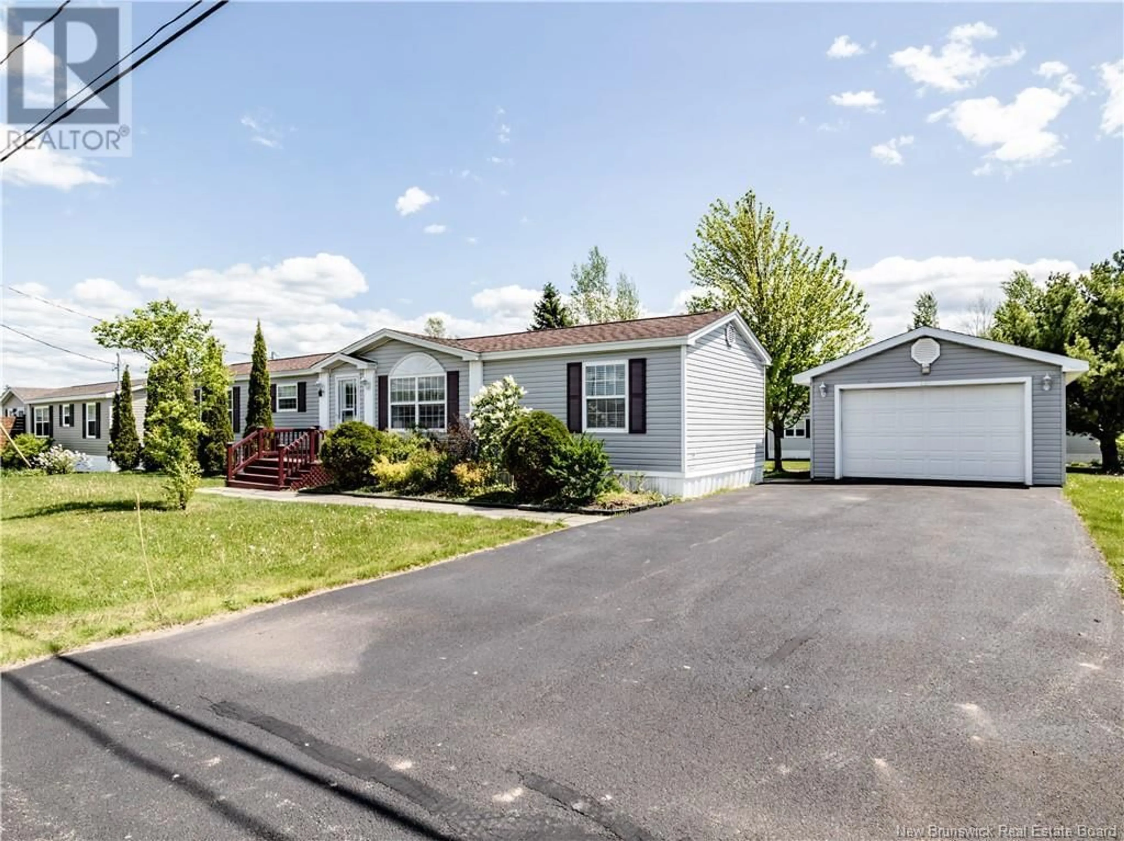 Home with vinyl exterior material, street for 18 BLUE ASH, Moncton New Brunswick E1H3R2