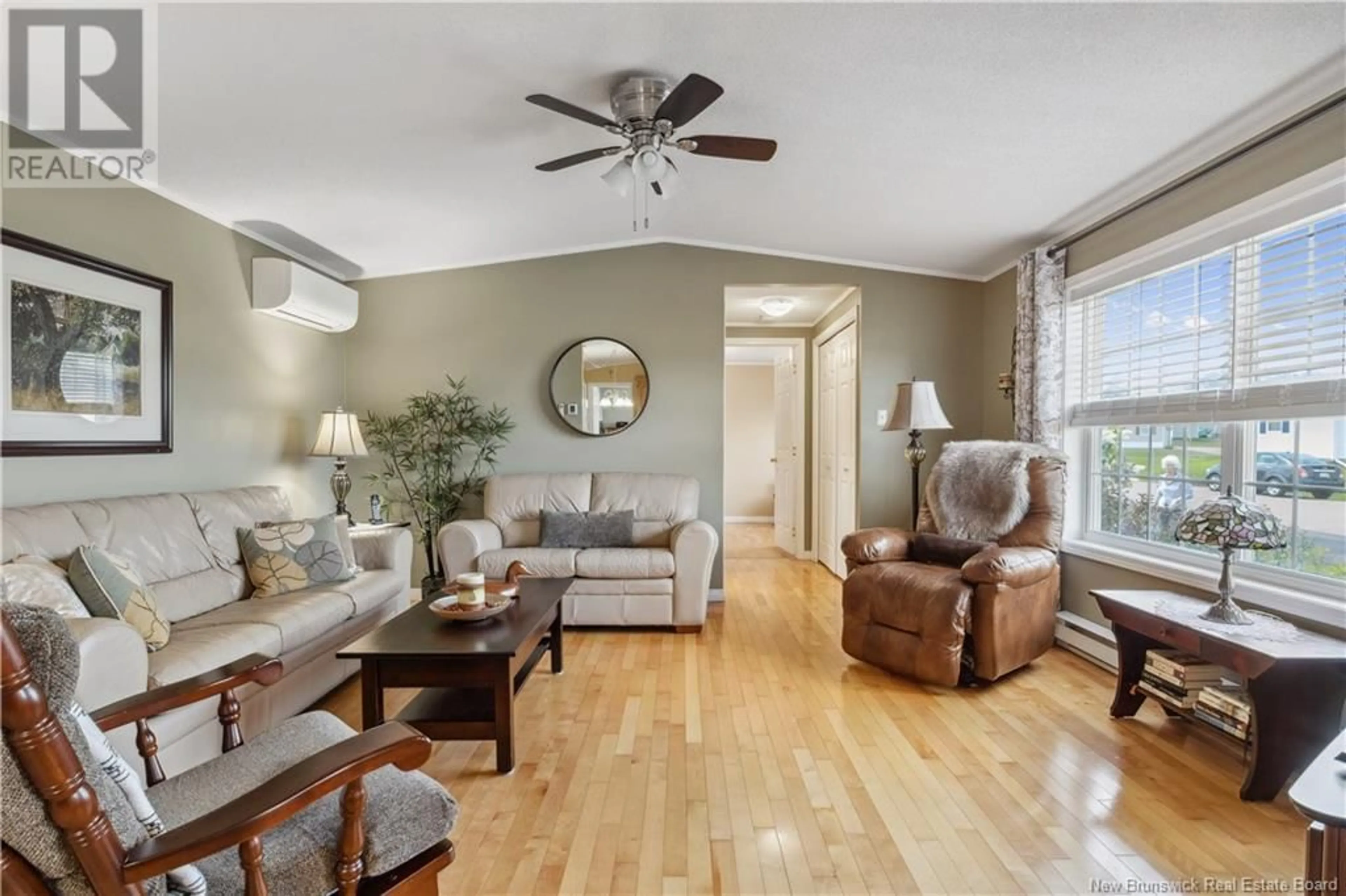 Living room with furniture, wood/laminate floor for 18 BLUE ASH, Moncton New Brunswick E1H3R2