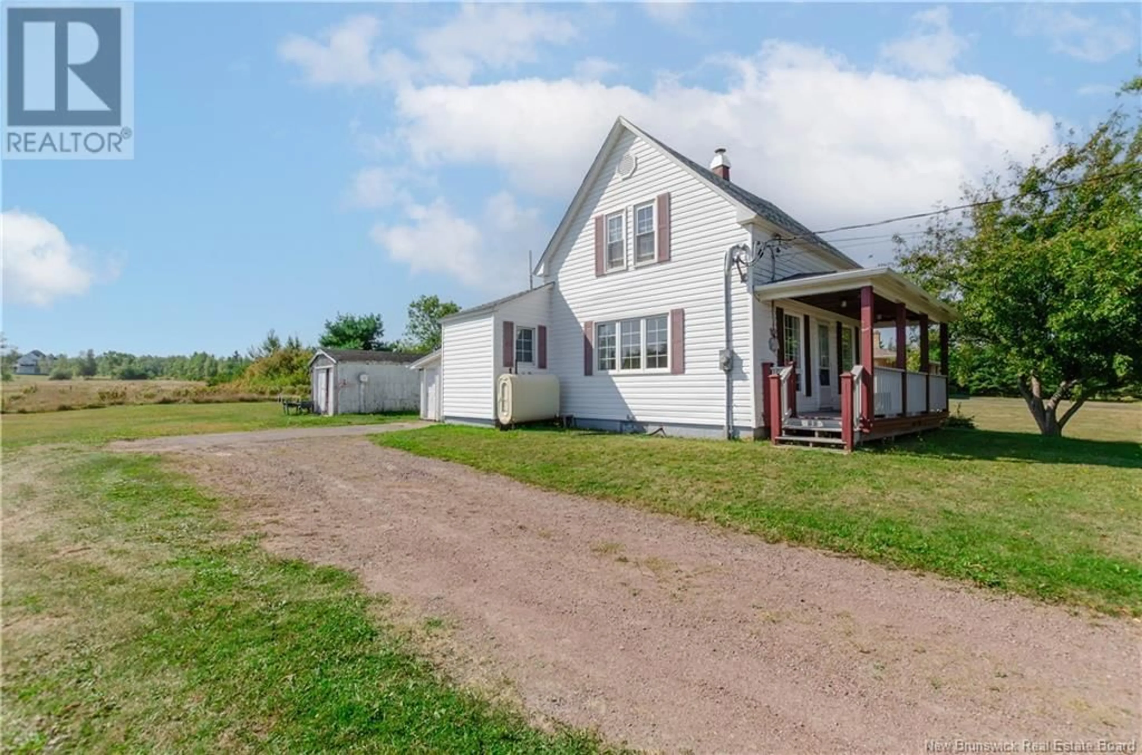 A pic from outside/outdoor area/front of a property/back of a property/a pic from drone, street for 1093 ROUTE 133, Grand-Barachois New Brunswick E4P8C4