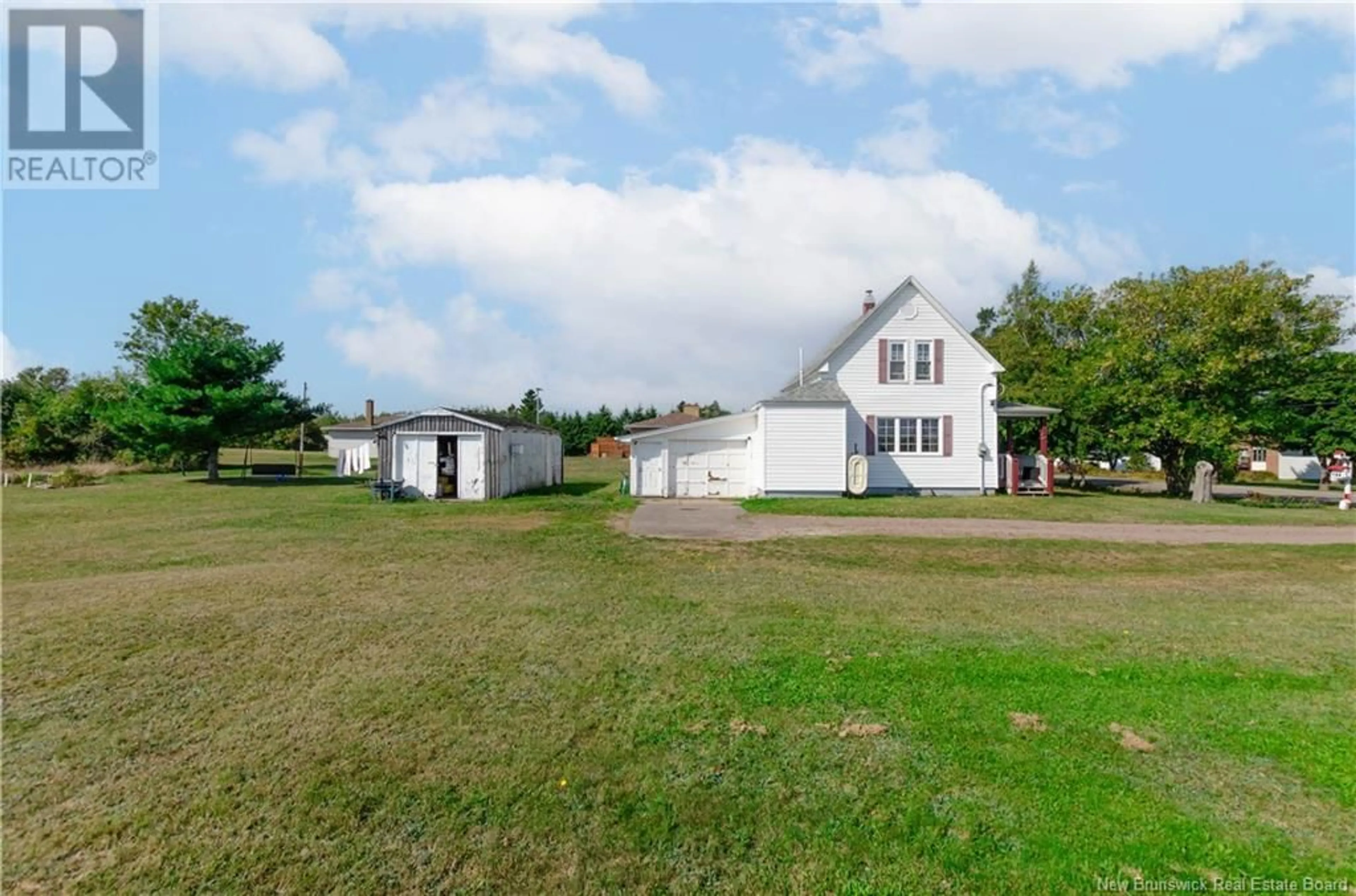 A pic from outside/outdoor area/front of a property/back of a property/a pic from drone, building for 1093 ROUTE 133, Grand-Barachois New Brunswick E4P8C4