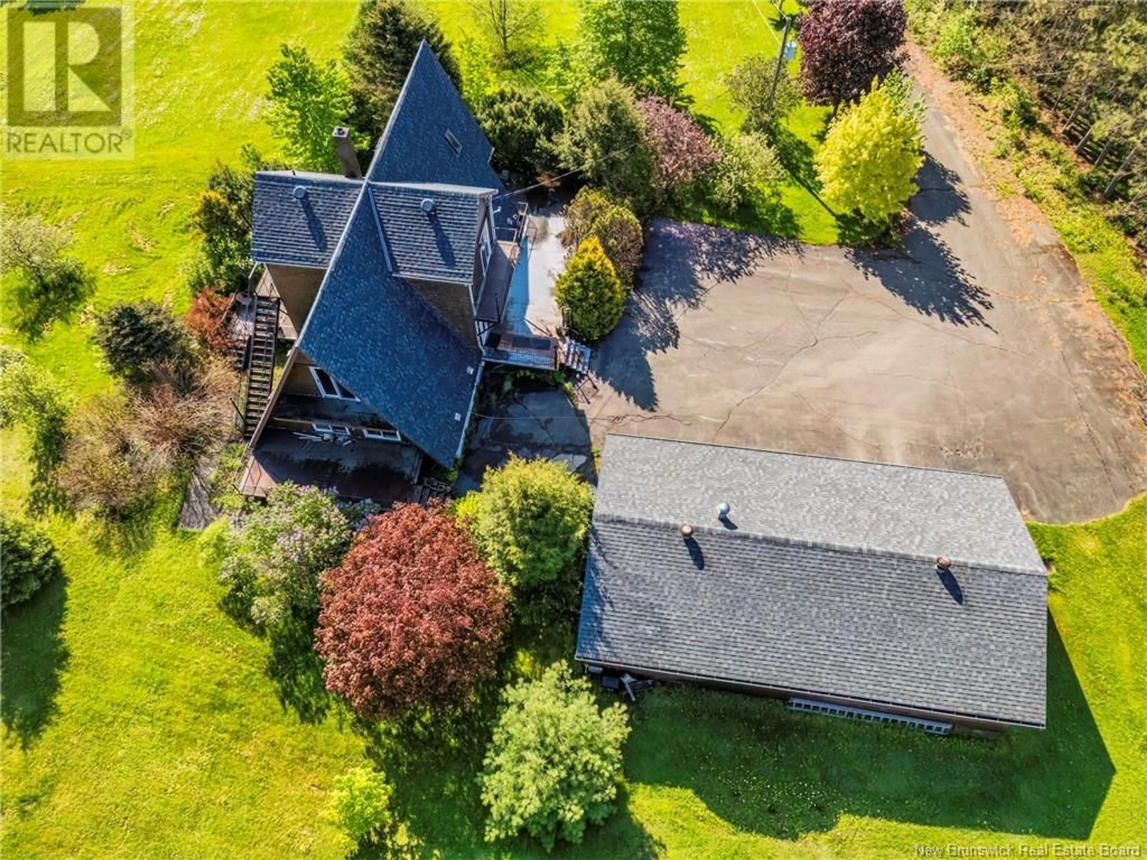 A pic from outside/outdoor area/front of a property/back of a property/a pic from drone, street for 13595 ROUTE 105, Tilley New Brunswick E7H4A1