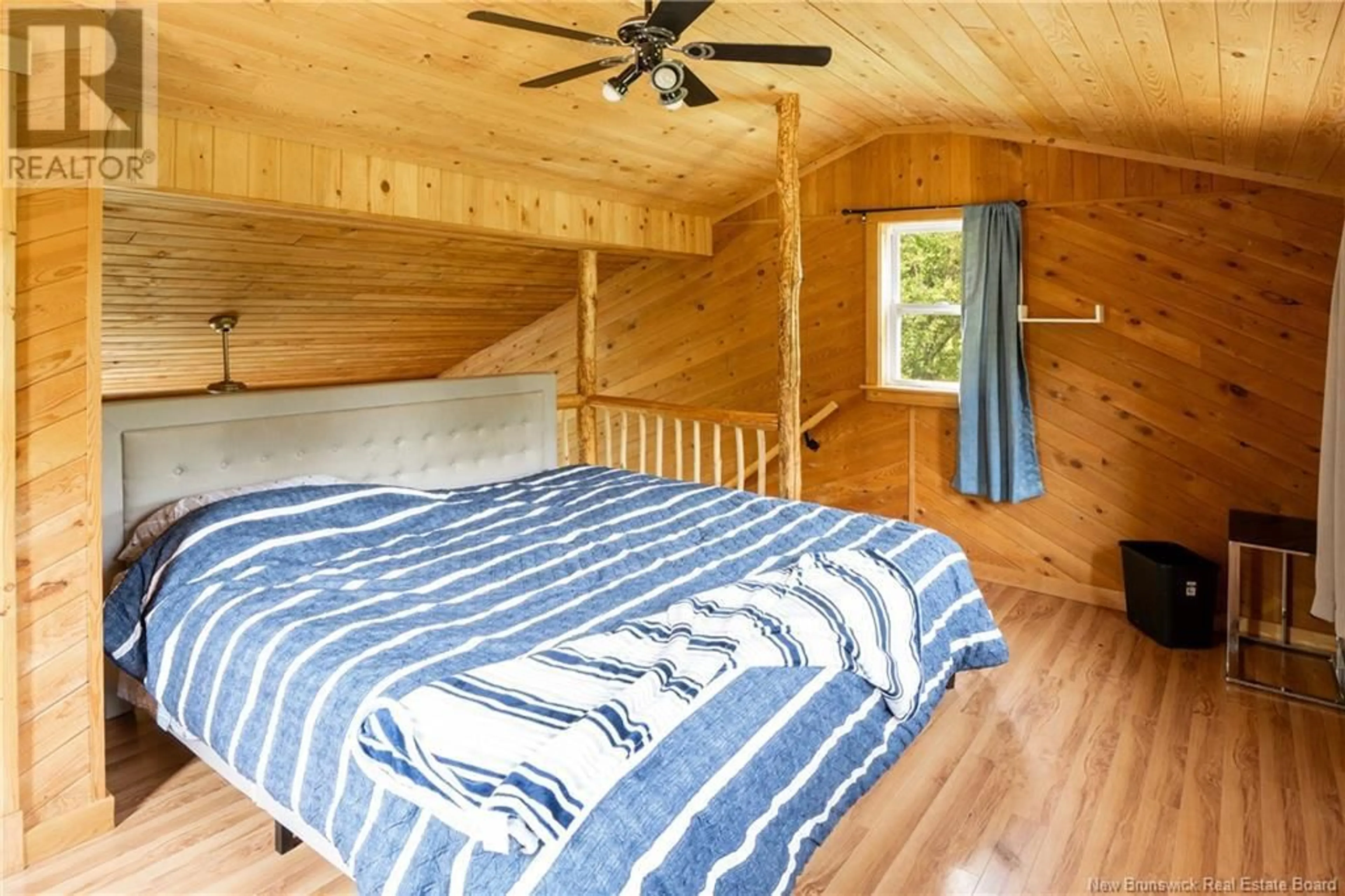 Bedroom with bed, wood/laminate floor for 71 TEED ROAD, Notre-Dame New Brunswick E4V2L8