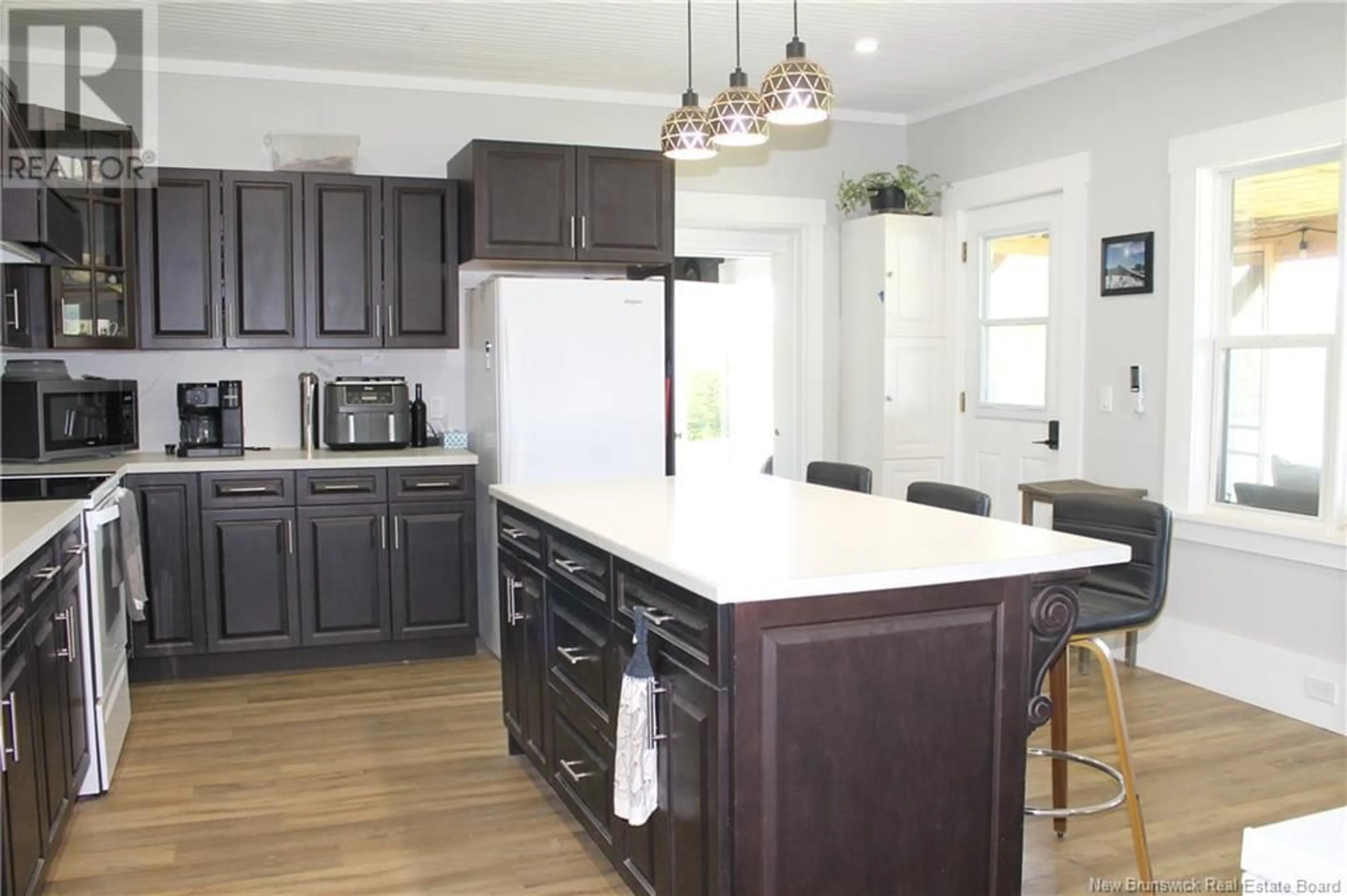 Open concept kitchen, wood/laminate floor for 90 ROUTE 615, Jewetts Mills New Brunswick E6L1M2