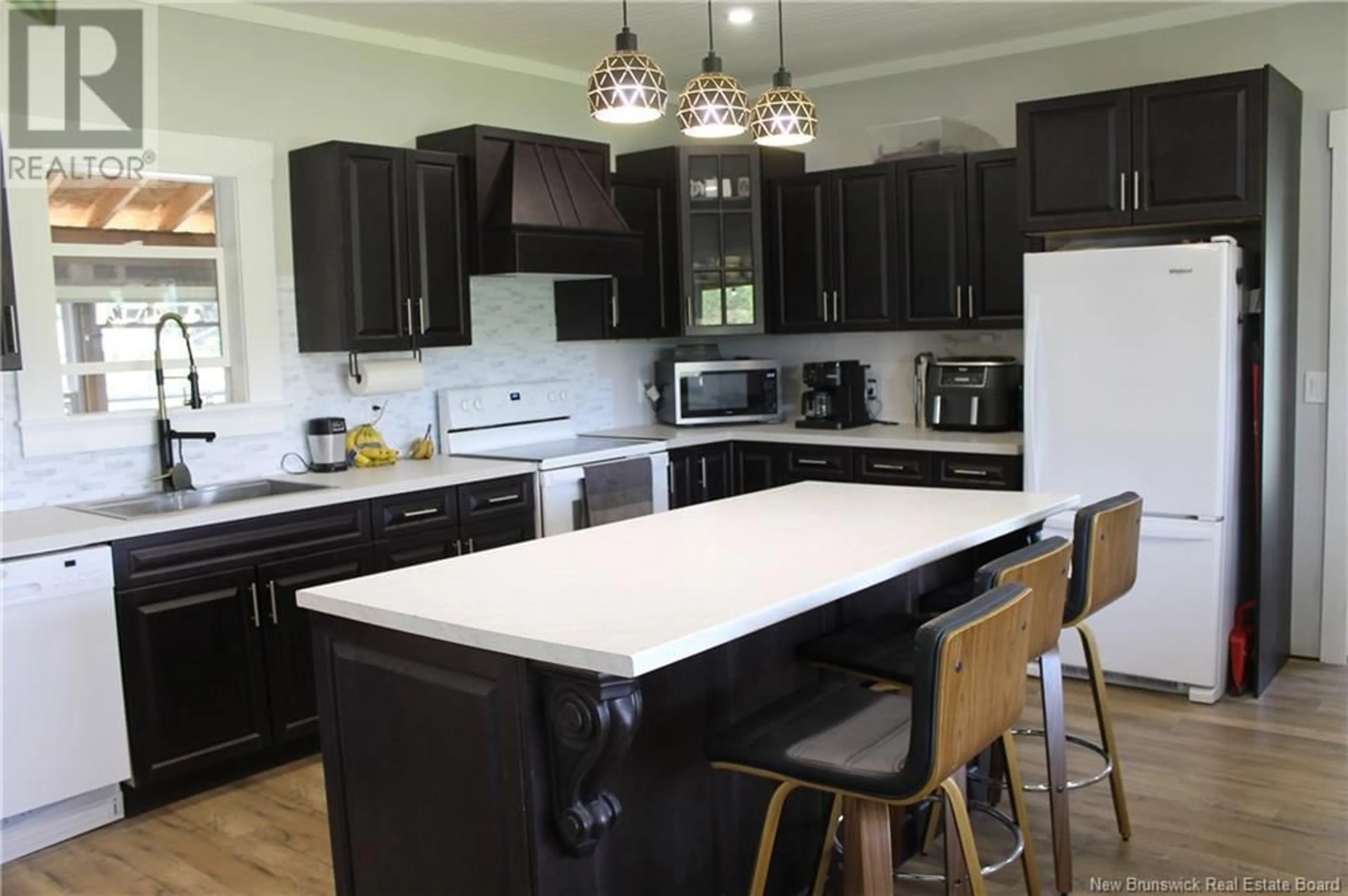 Open concept kitchen, wood/laminate floor for 90 ROUTE 615, Jewetts Mills New Brunswick E6L1M2