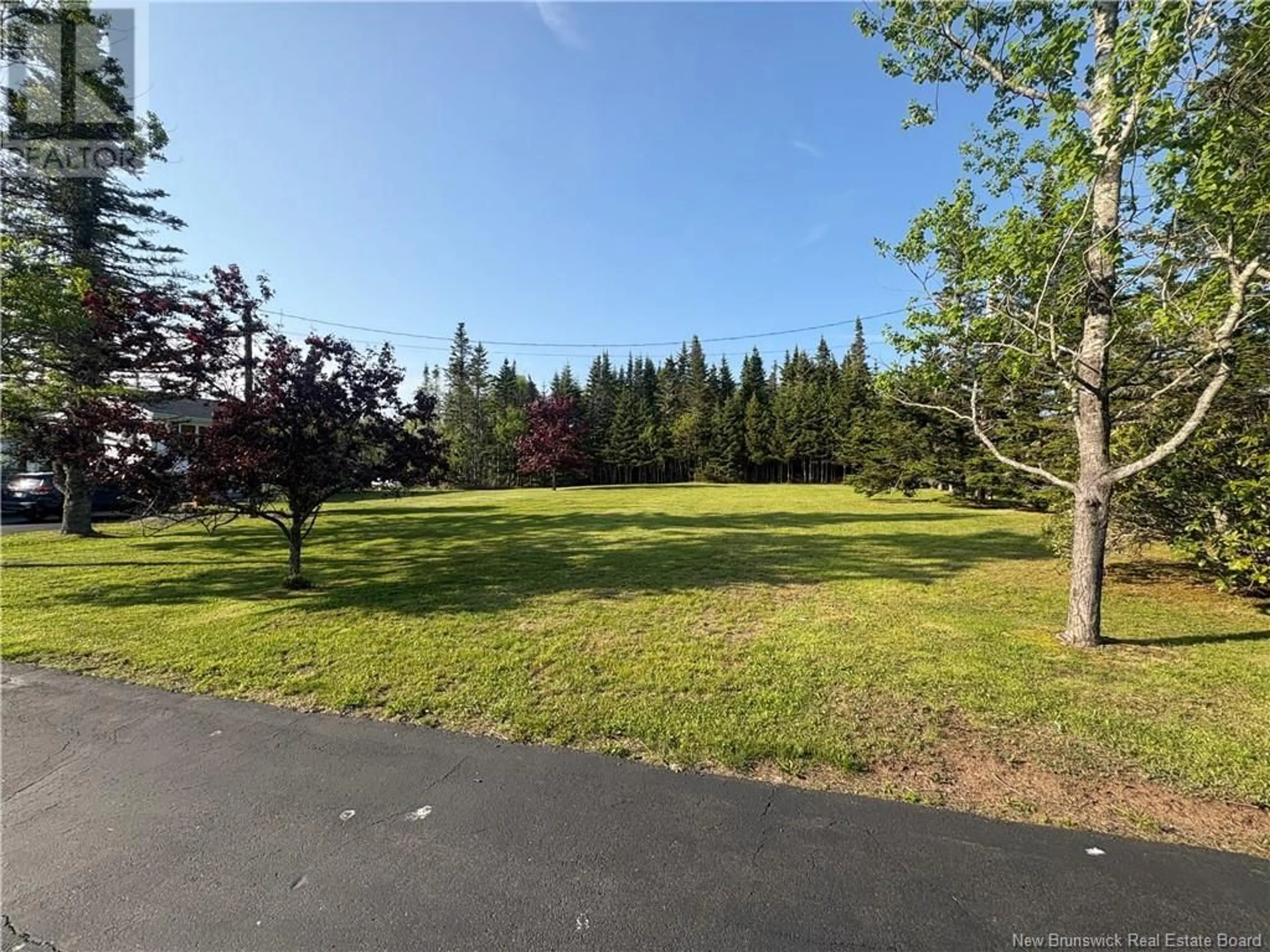 A pic from outside/outdoor area/front of a property/back of a property/a pic from drone, forest/trees view for 68 RIDGE ROAD, Maces Bay New Brunswick E5J1V4
