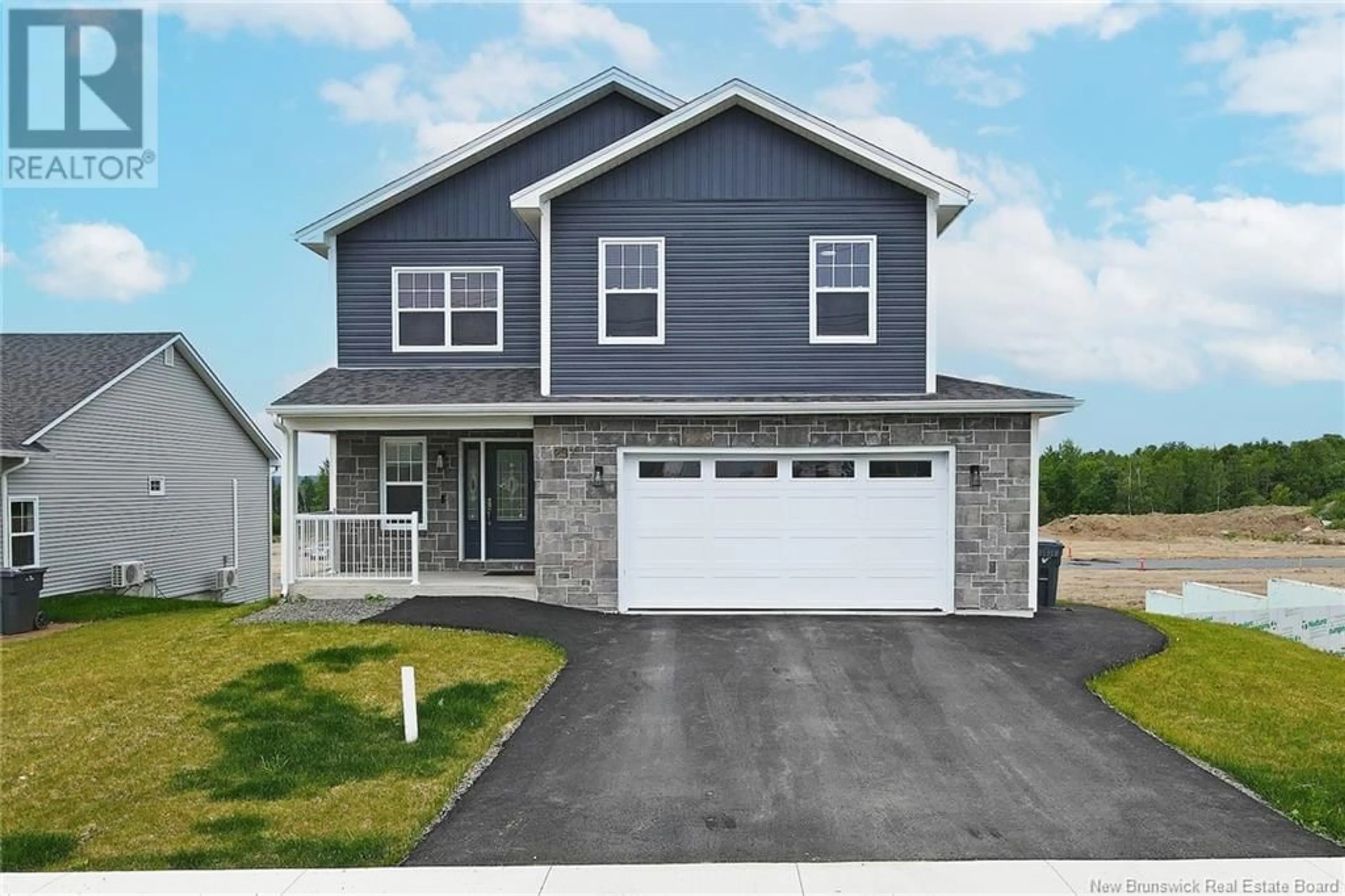 Home with vinyl exterior material, street for 297 HERON DRIVE, Fredericton New Brunswick E3G0H2