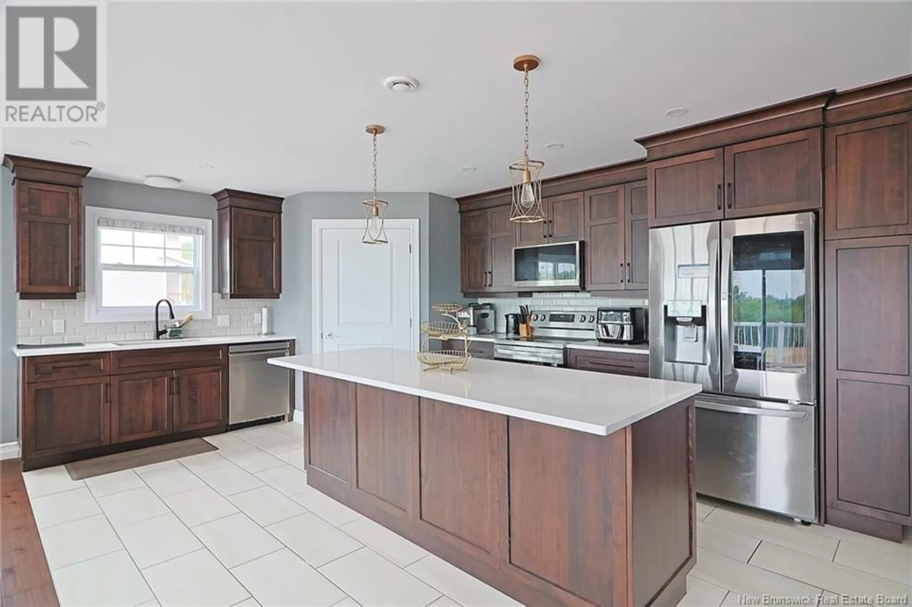 Open concept kitchen, ceramic/tile floor for 297 HERON DRIVE, Fredericton New Brunswick E3G0H2