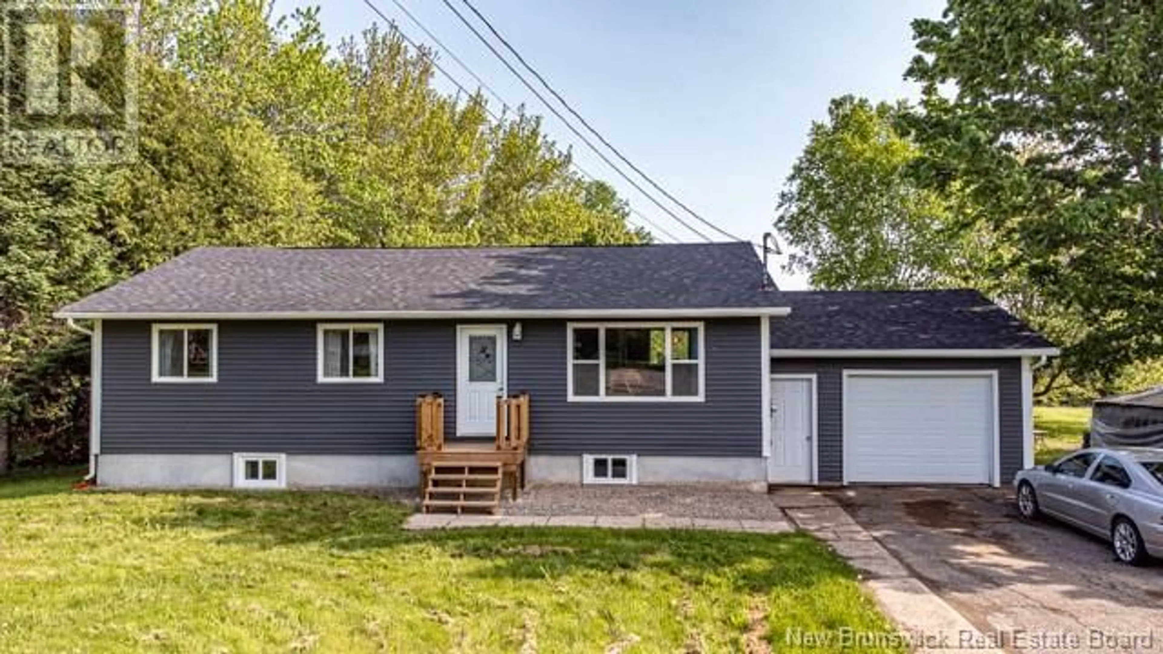 Home with vinyl exterior material, street for 102 - 243 NEW BRUNSWICK, Burton New Brunswick E2V3B2