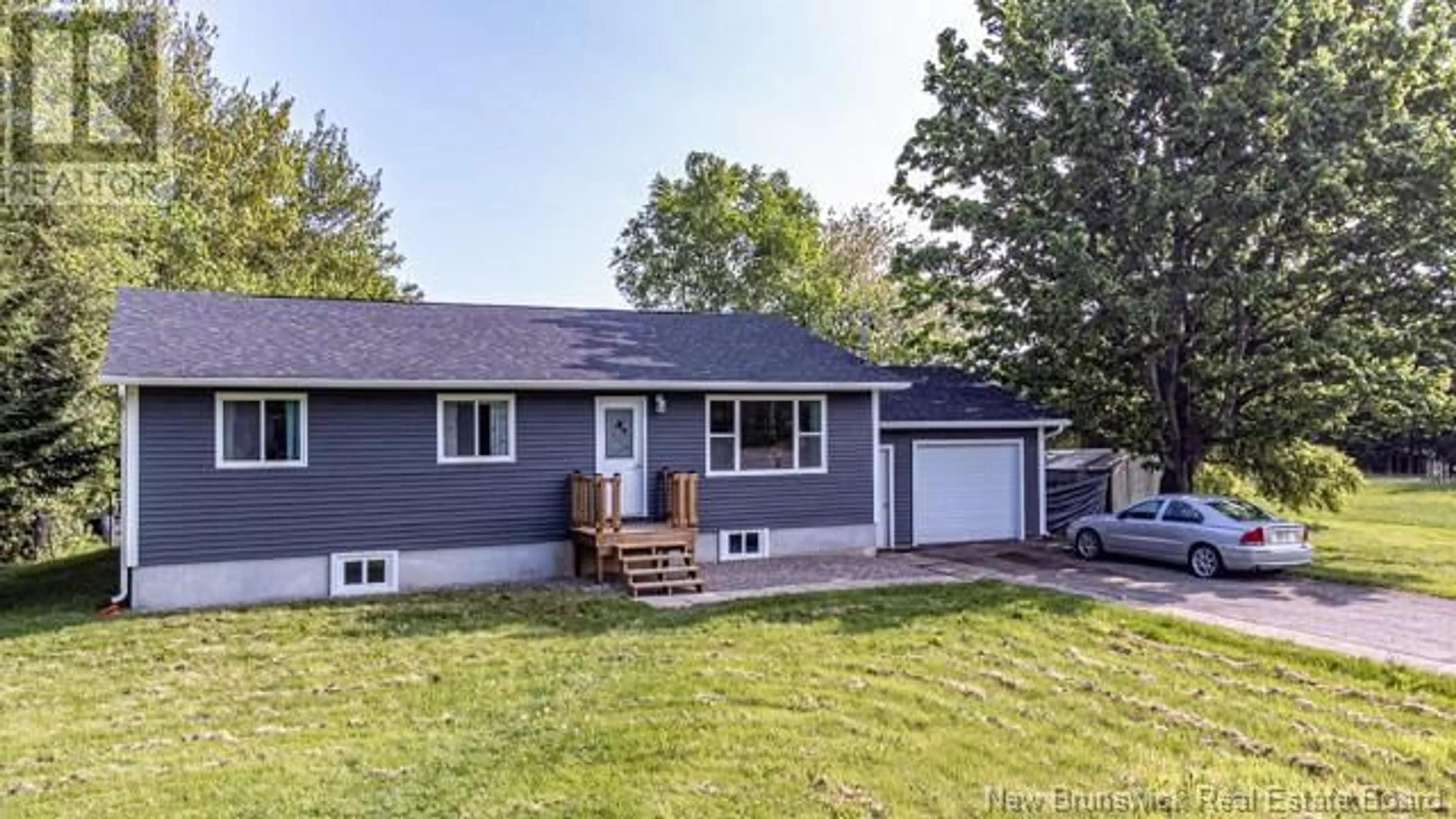 Home with vinyl exterior material, street for 102 - 243 NEW BRUNSWICK, Burton New Brunswick E2V3B2
