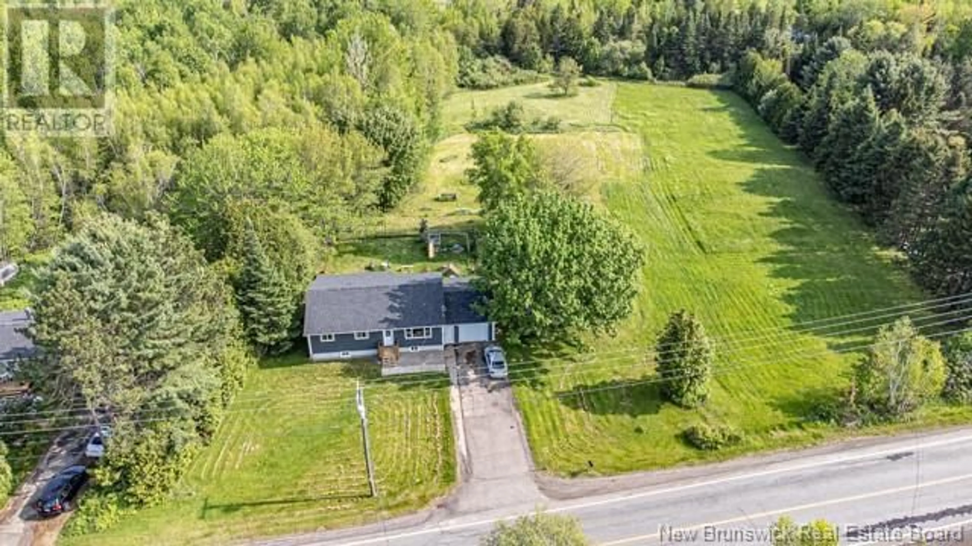 A pic from outside/outdoor area/front of a property/back of a property/a pic from drone, unknown for 102 - 243 NEW BRUNSWICK, Burton New Brunswick E2V3B2