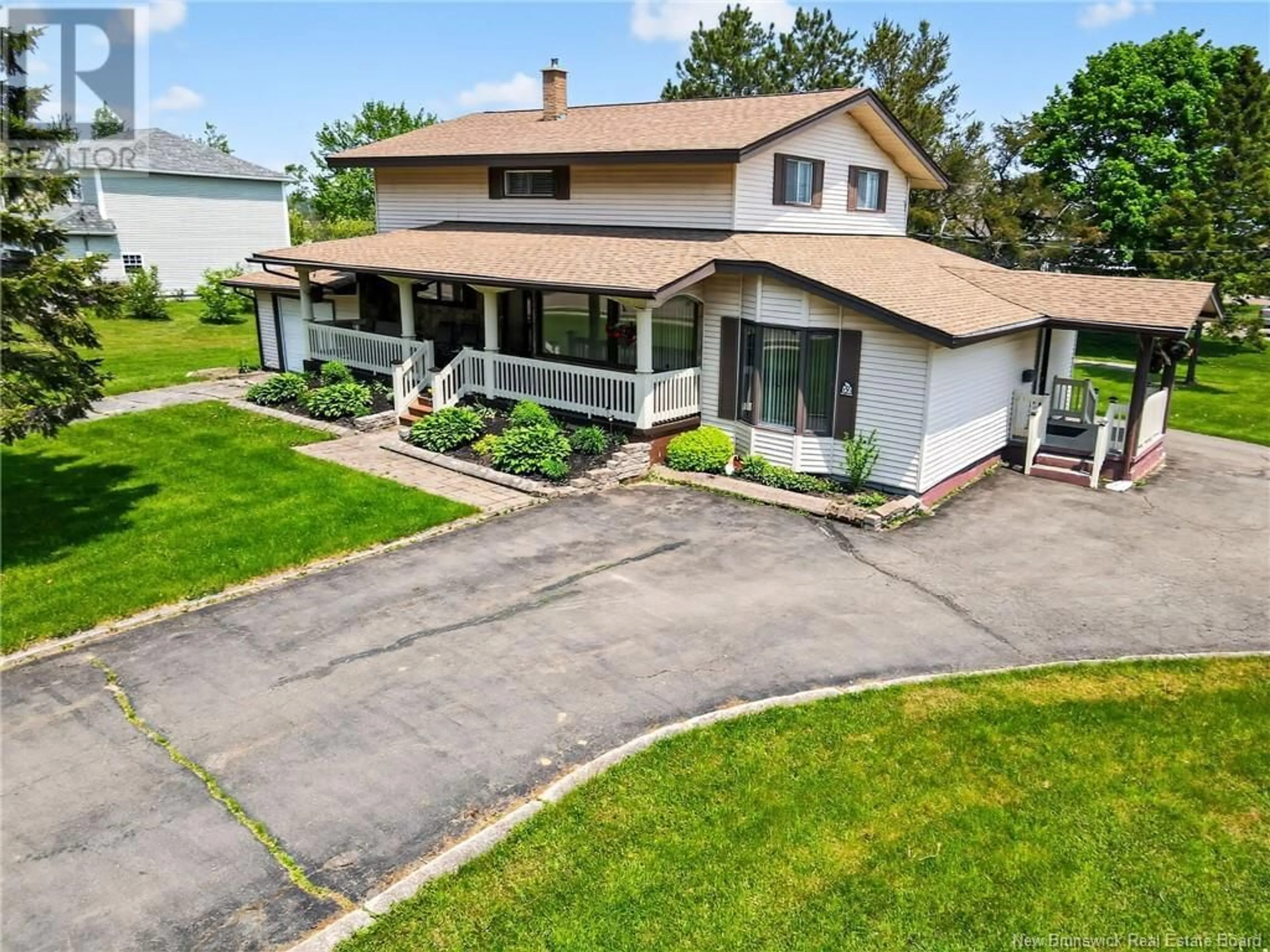 A pic from outside/outdoor area/front of a property/back of a property/a pic from drone, street for 52 ACADIE STREET, Bouctouche New Brunswick E4S2T2