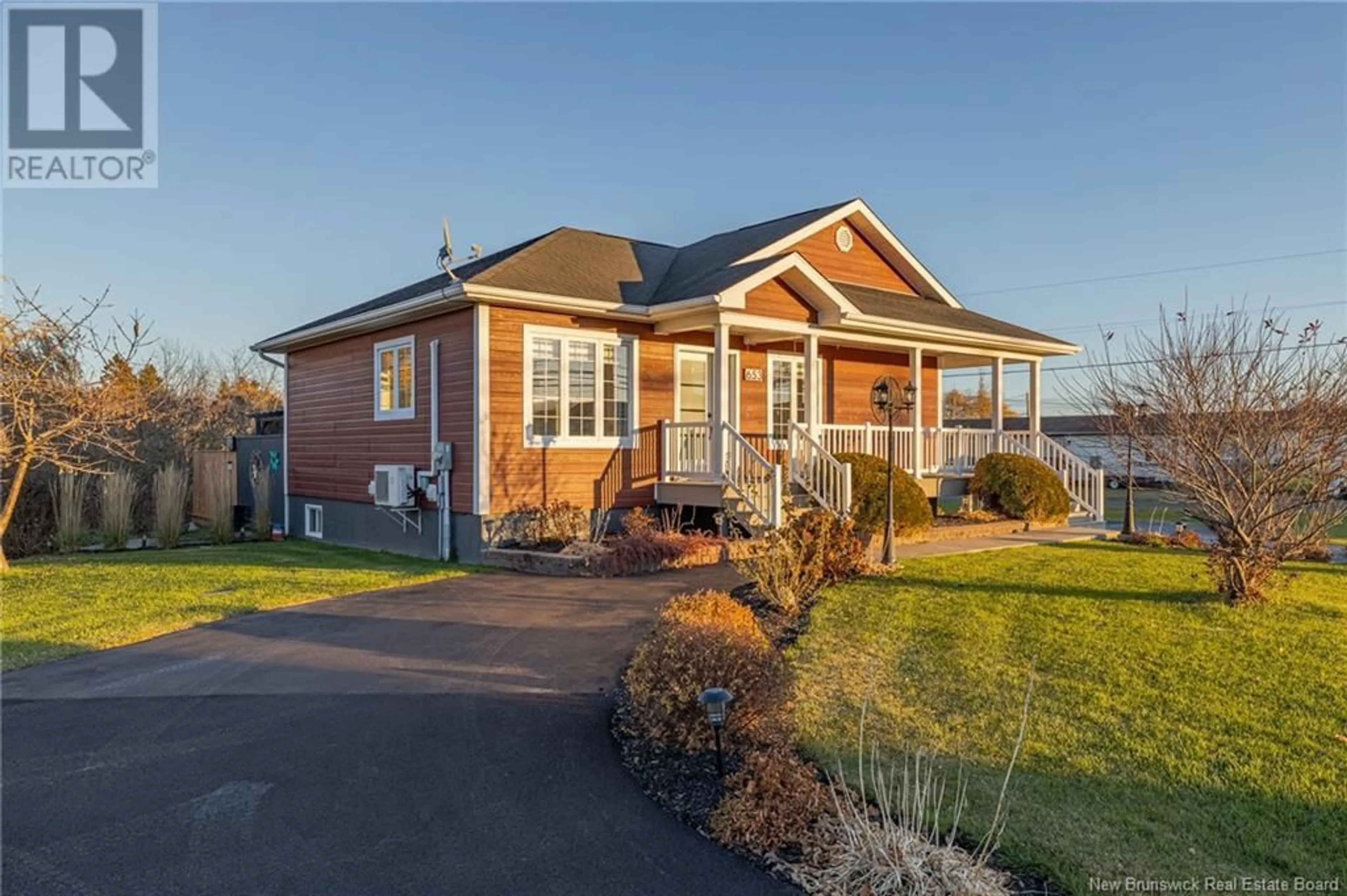 Home with brick exterior material, street for 653 RUE PRINCIPALE, Beresford New Brunswick E8K3X5