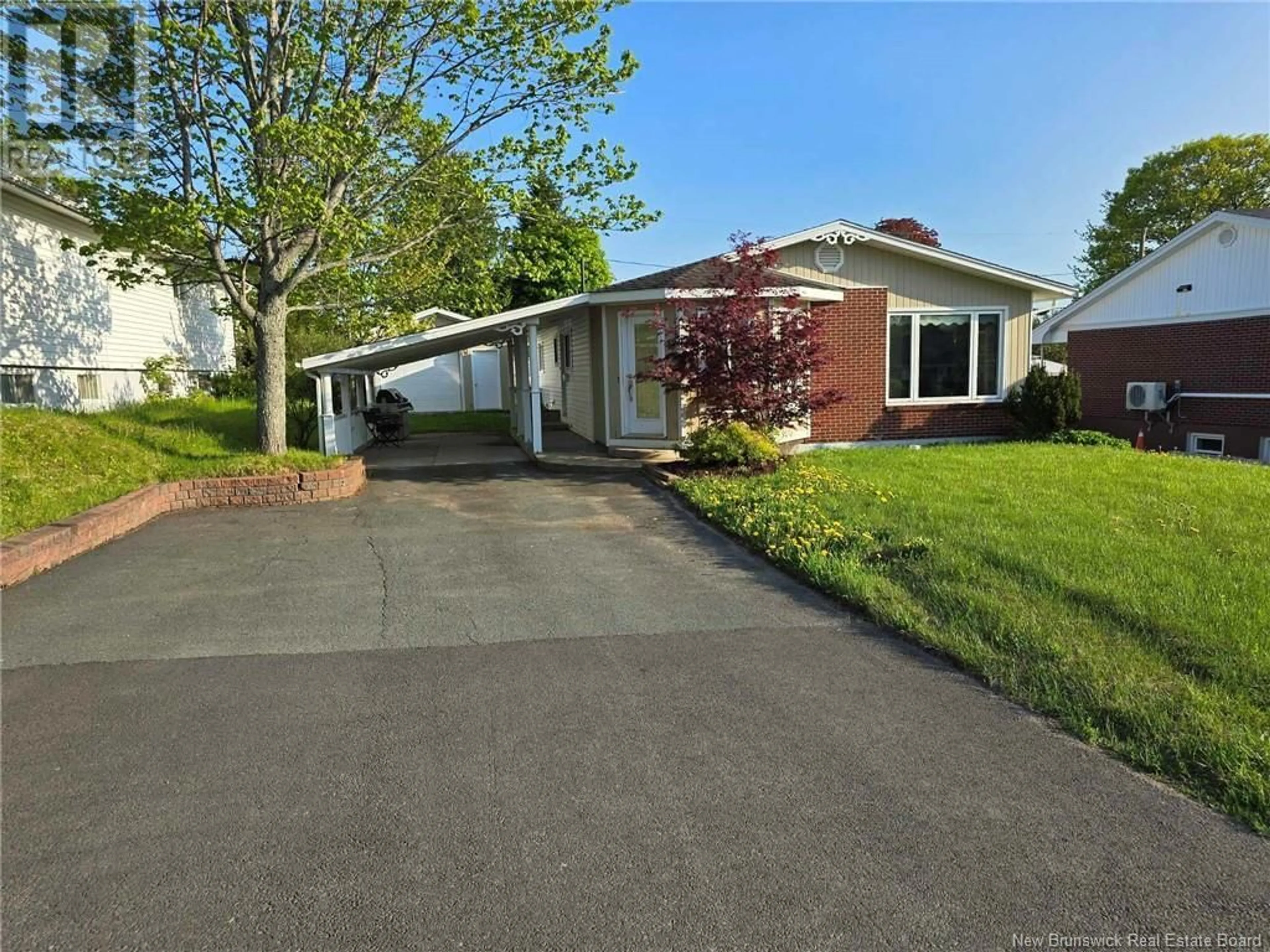Home with vinyl exterior material, street for 465 VARRILY STREET, Bathurst New Brunswick E2A2P2