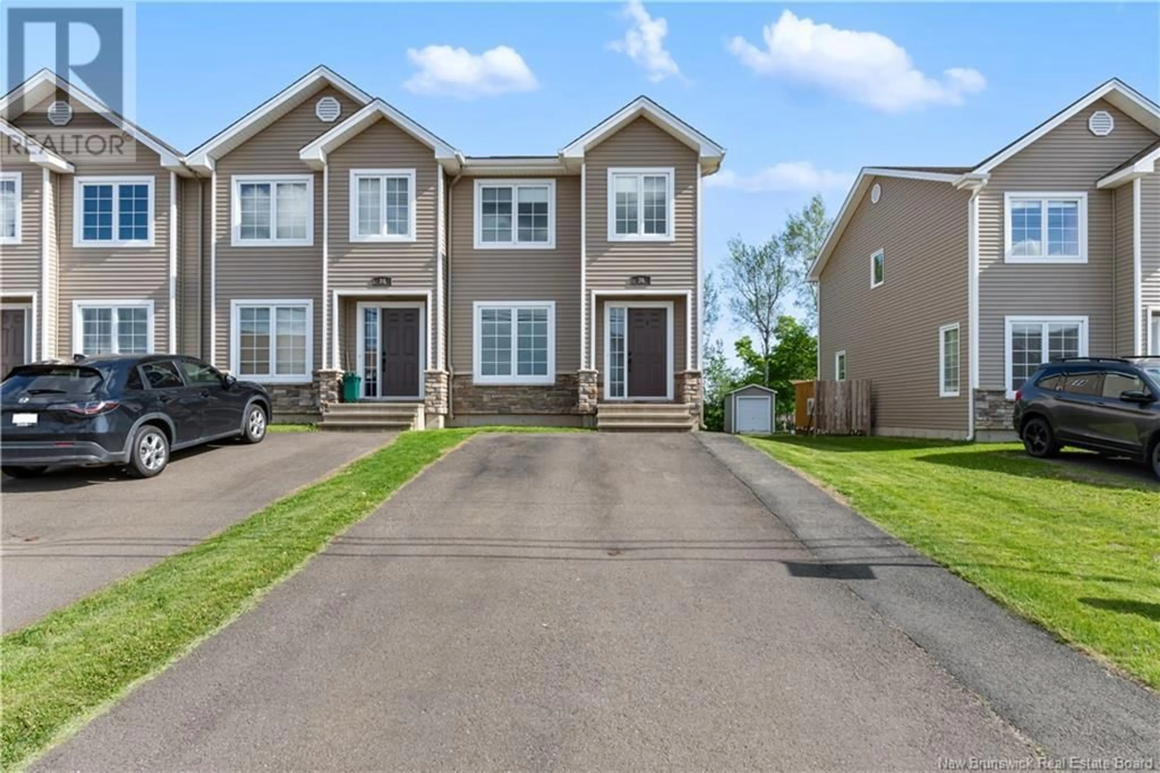 Home with vinyl exterior material, street for 36 LIONEL, Dieppe New Brunswick E1A8Z1