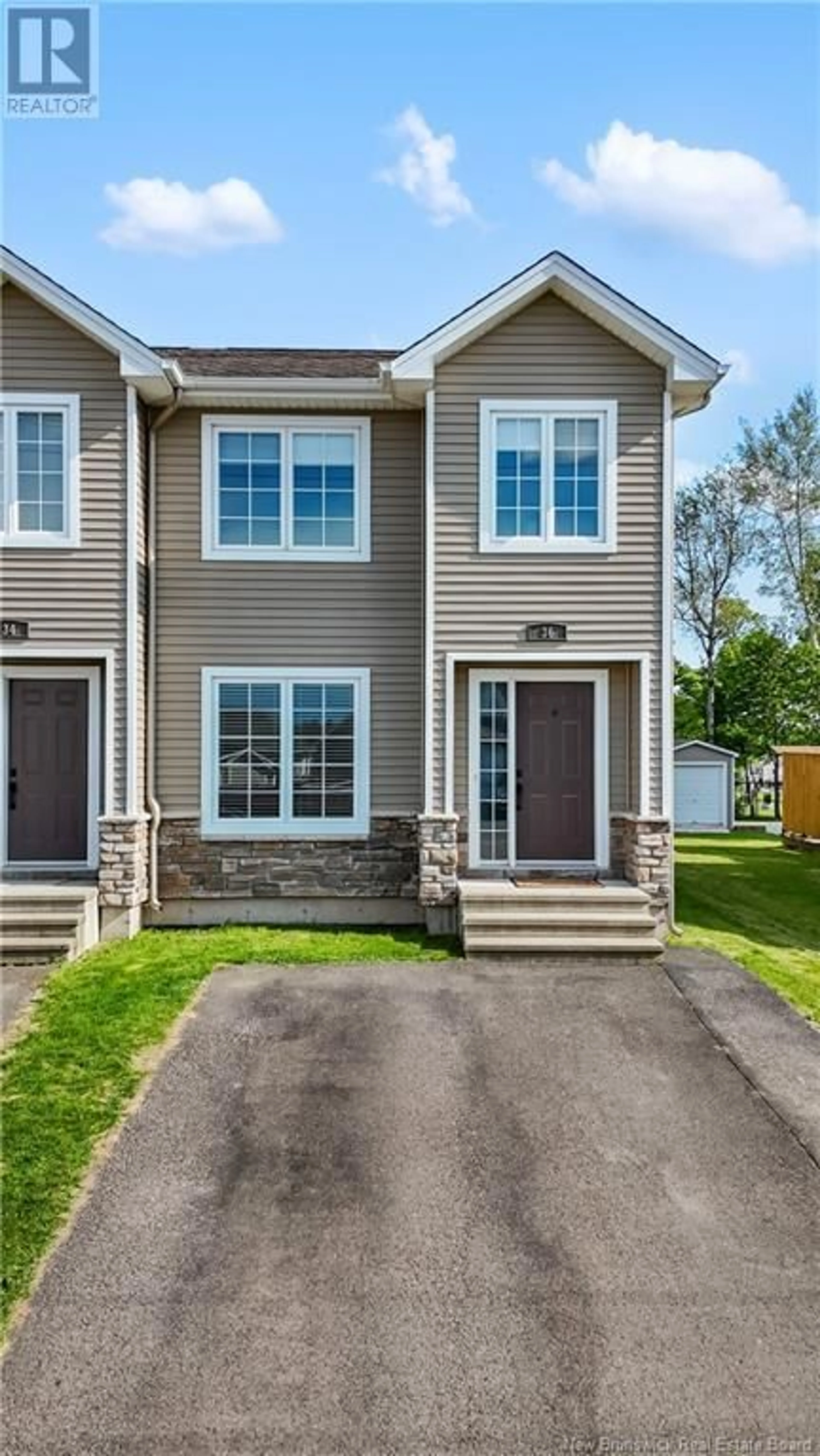 Home with vinyl exterior material, street for 36 LIONEL, Dieppe New Brunswick E1A8Z1