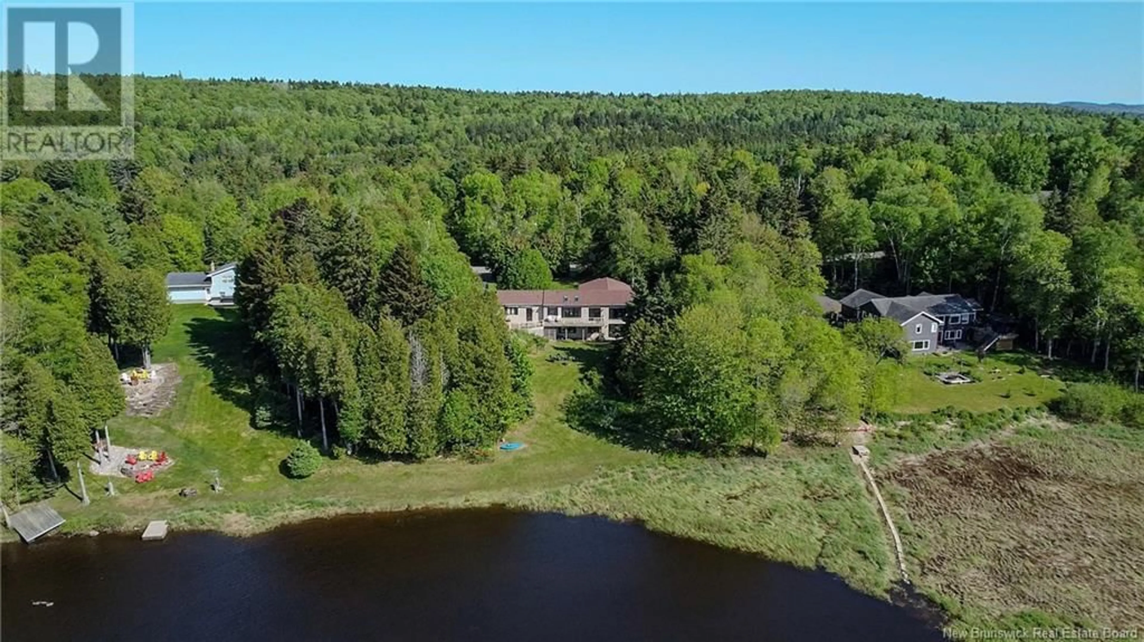 A pic from outside/outdoor area/front of a property/back of a property/a pic from drone, water/lake/river/ocean view for 15 DOUGLAS DRIVE, Quispamsis New Brunswick E2G1Y3