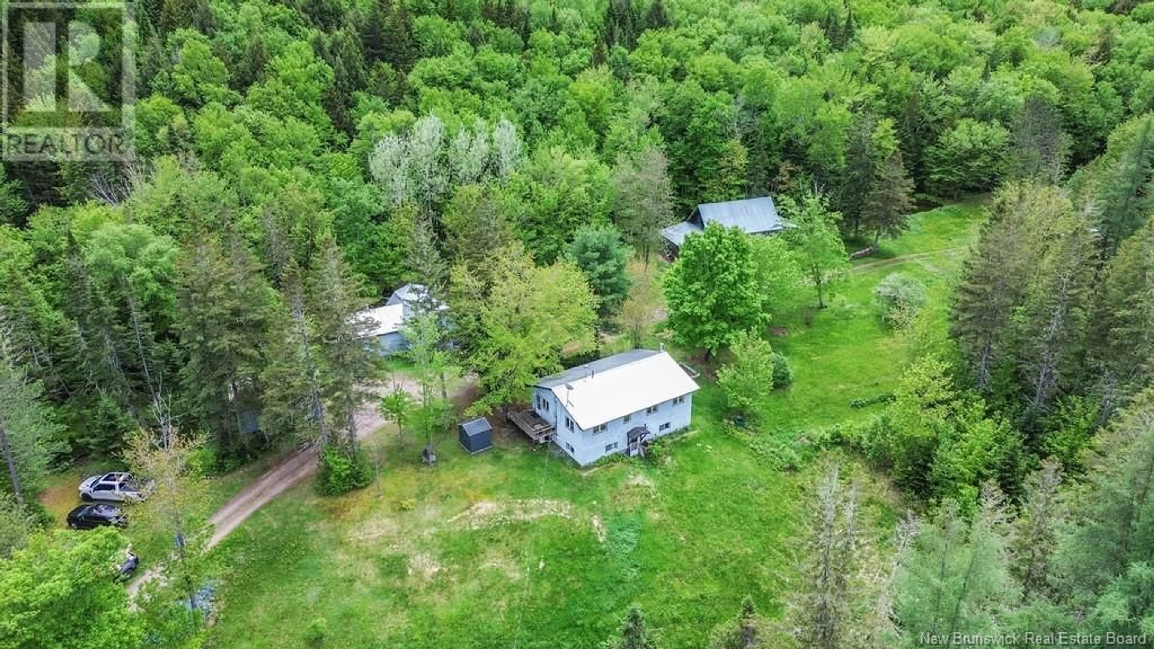 A pic from outside/outdoor area/front of a property/back of a property/a pic from drone, forest/trees view for 243 ROUTE 107, Nashwaak Bridge New Brunswick E6C2G5