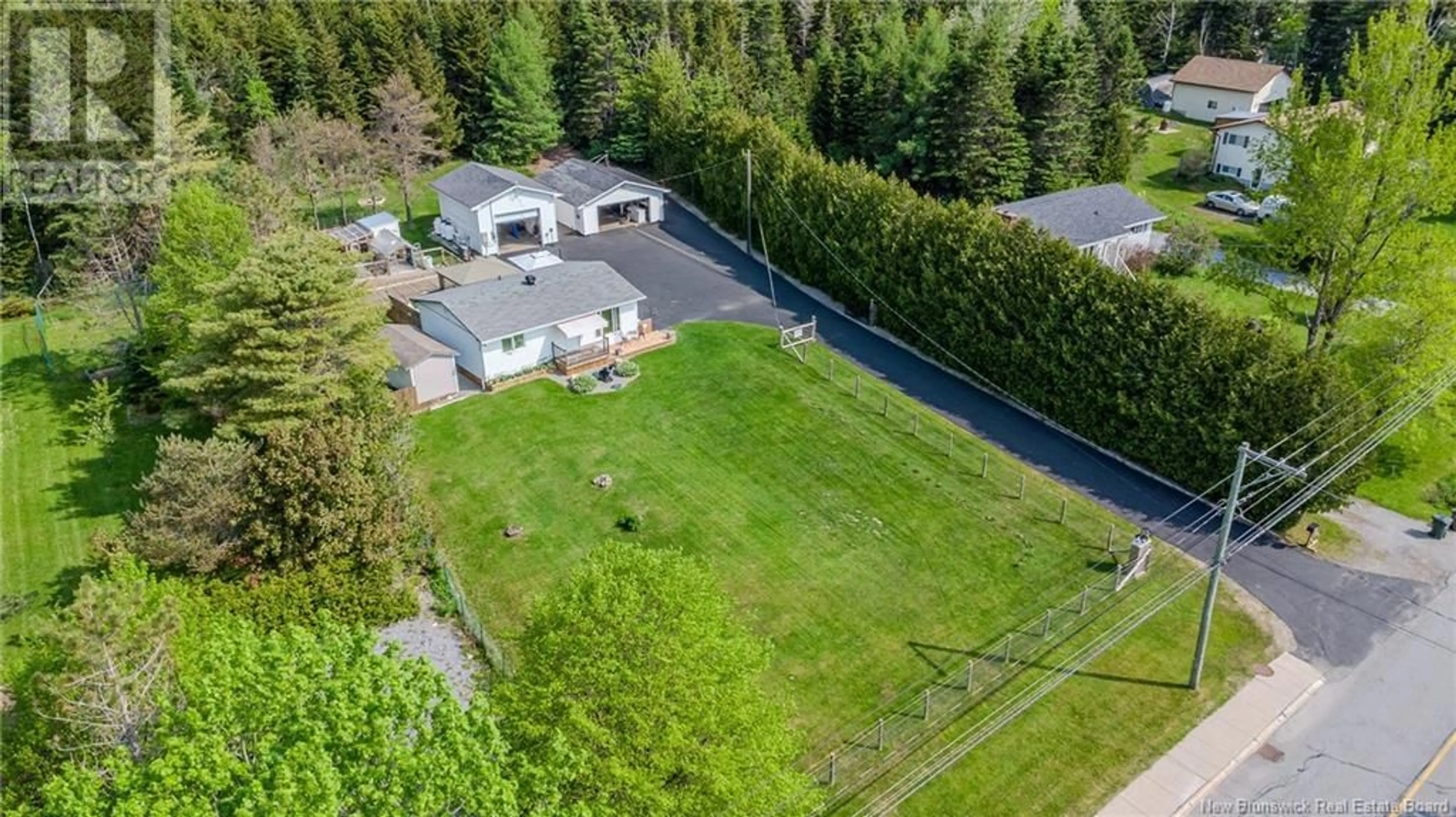 A pic from outside/outdoor area/front of a property/back of a property/a pic from drone, street for 2745 LOCH LOMOND ROAD, Saint John New Brunswick E2N1A7