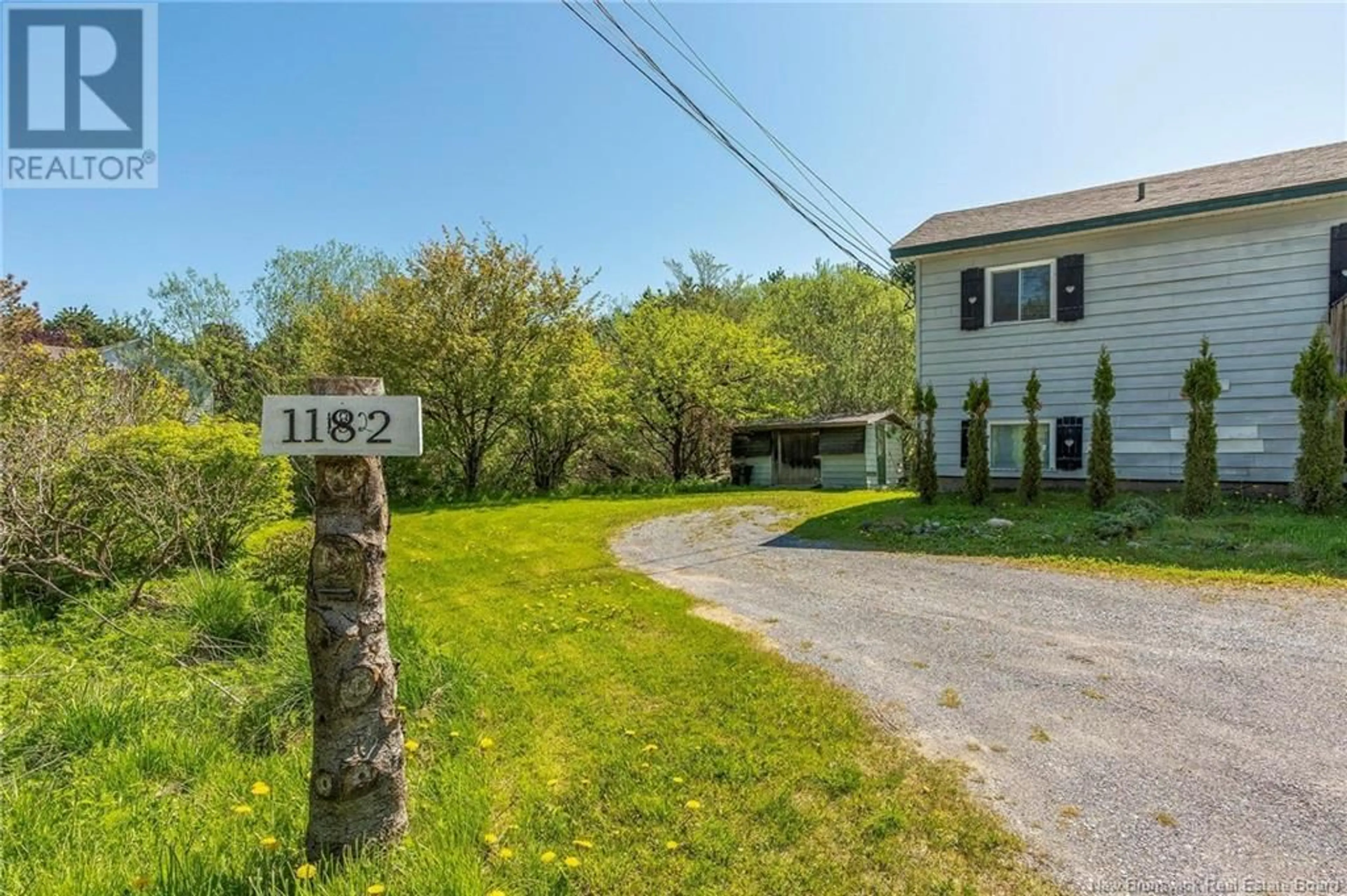 A pic from outside/outdoor area/front of a property/back of a property/a pic from drone, street for 1182 ROTHESAY ROAD, Saint John New Brunswick E2H2J1