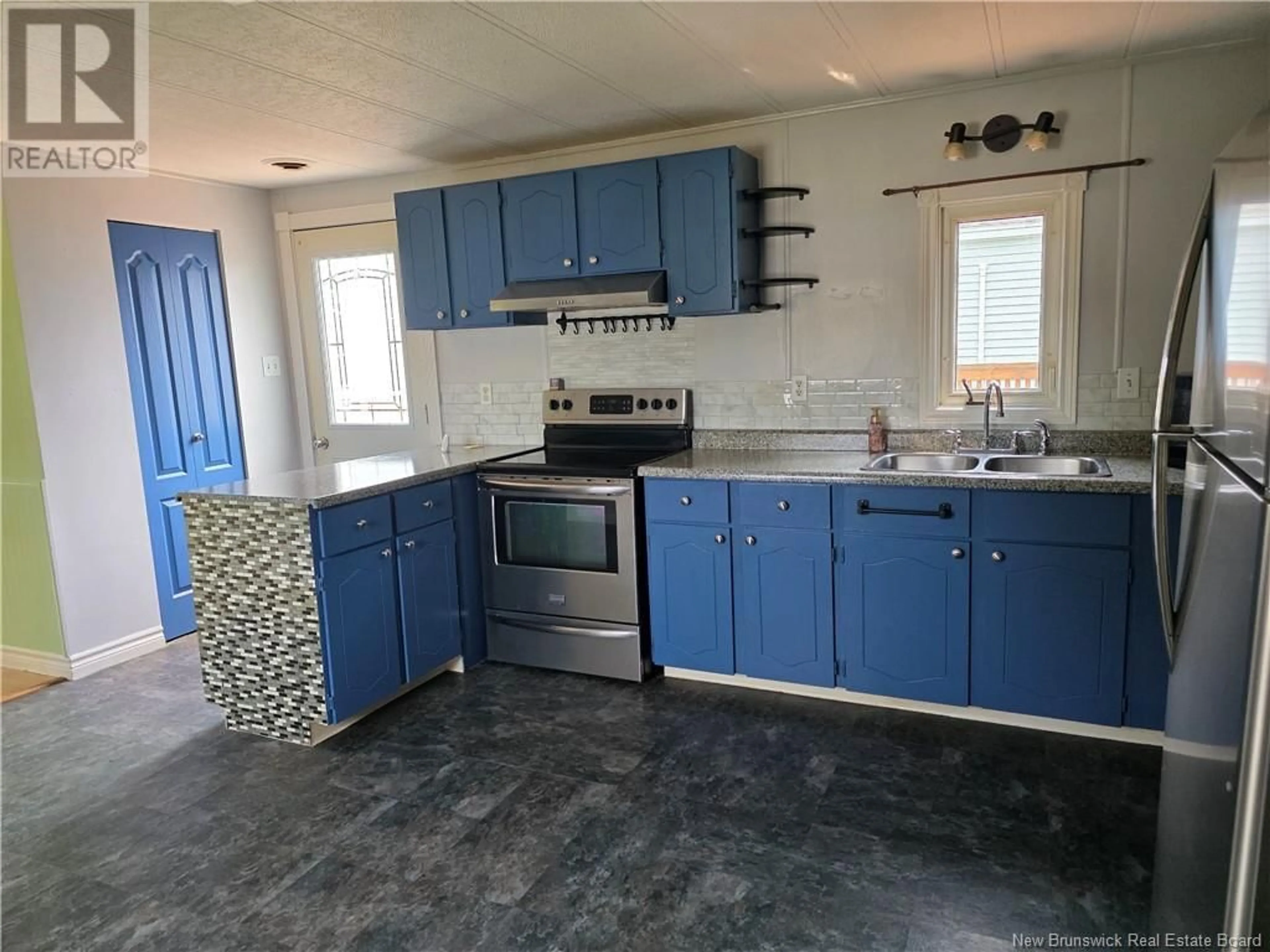 Open concept kitchen, ceramic/tile floor for 15 LESLEE DRIVE, Lincoln New Brunswick E3B6W7