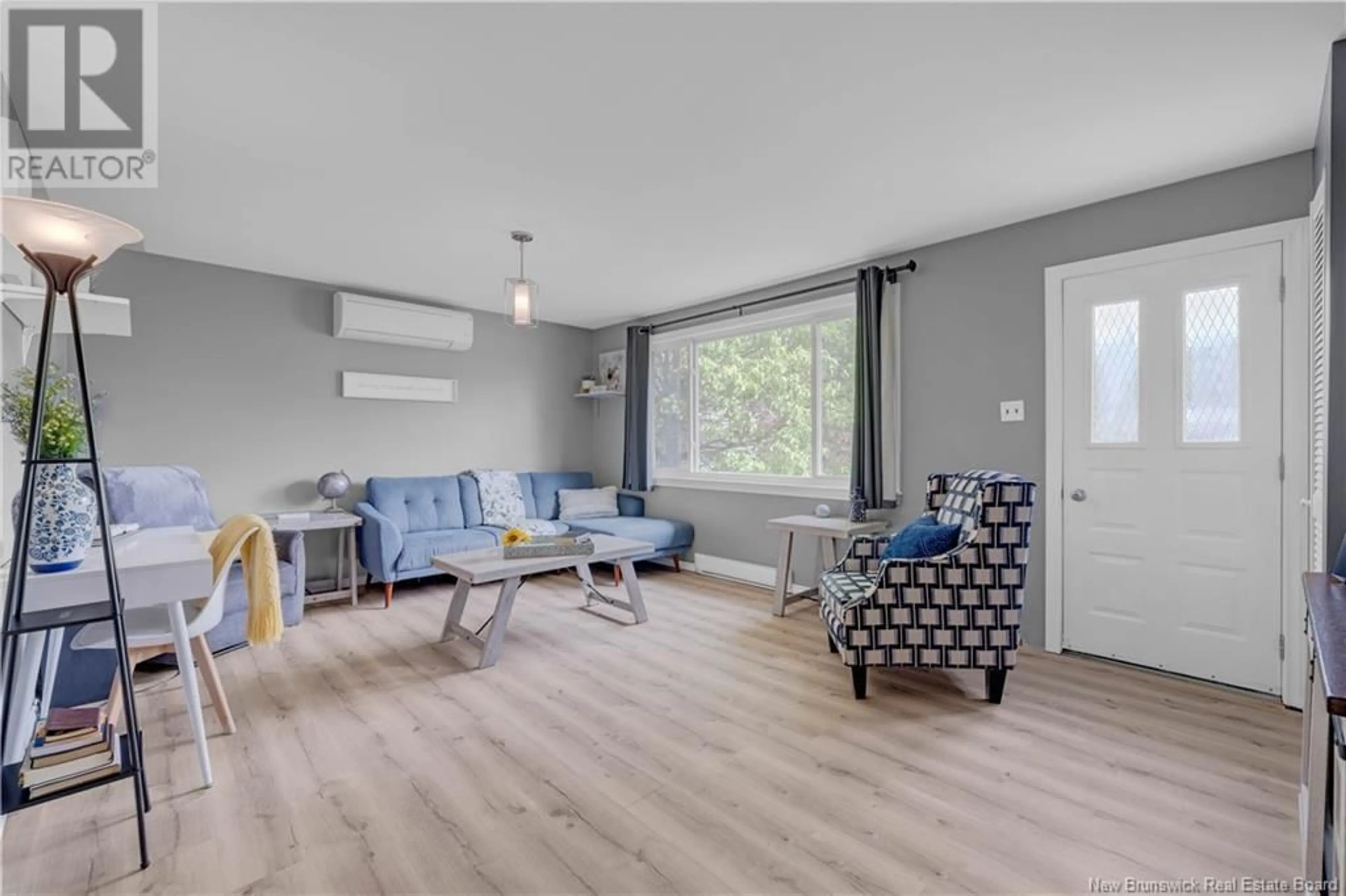 Living room with furniture, wood/laminate floor for 13 STEEVES CRESCENT, Rothesay New Brunswick E2S1C2