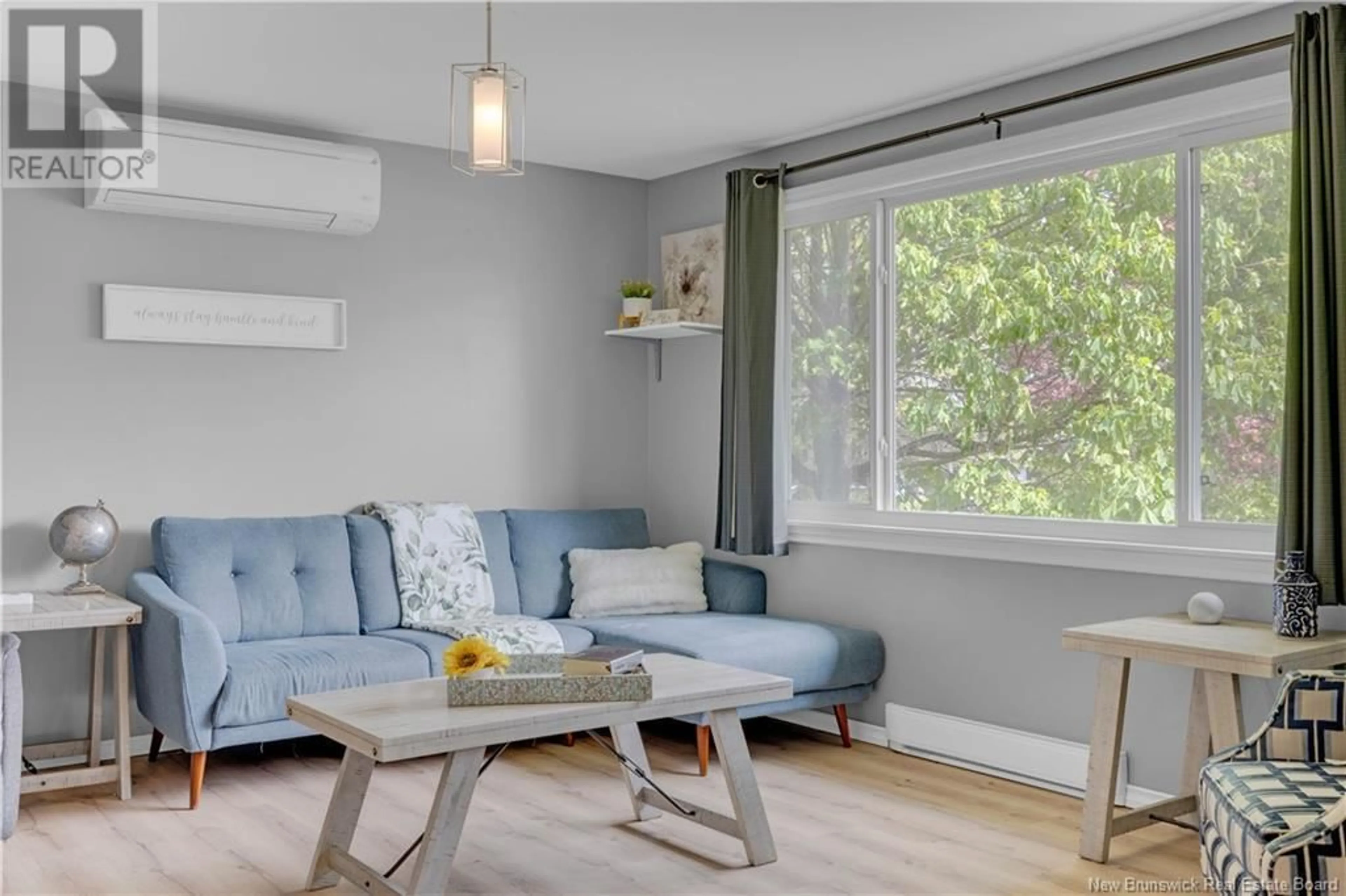 Living room with furniture, wood/laminate floor for 13 STEEVES CRESCENT, Rothesay New Brunswick E2S1C2