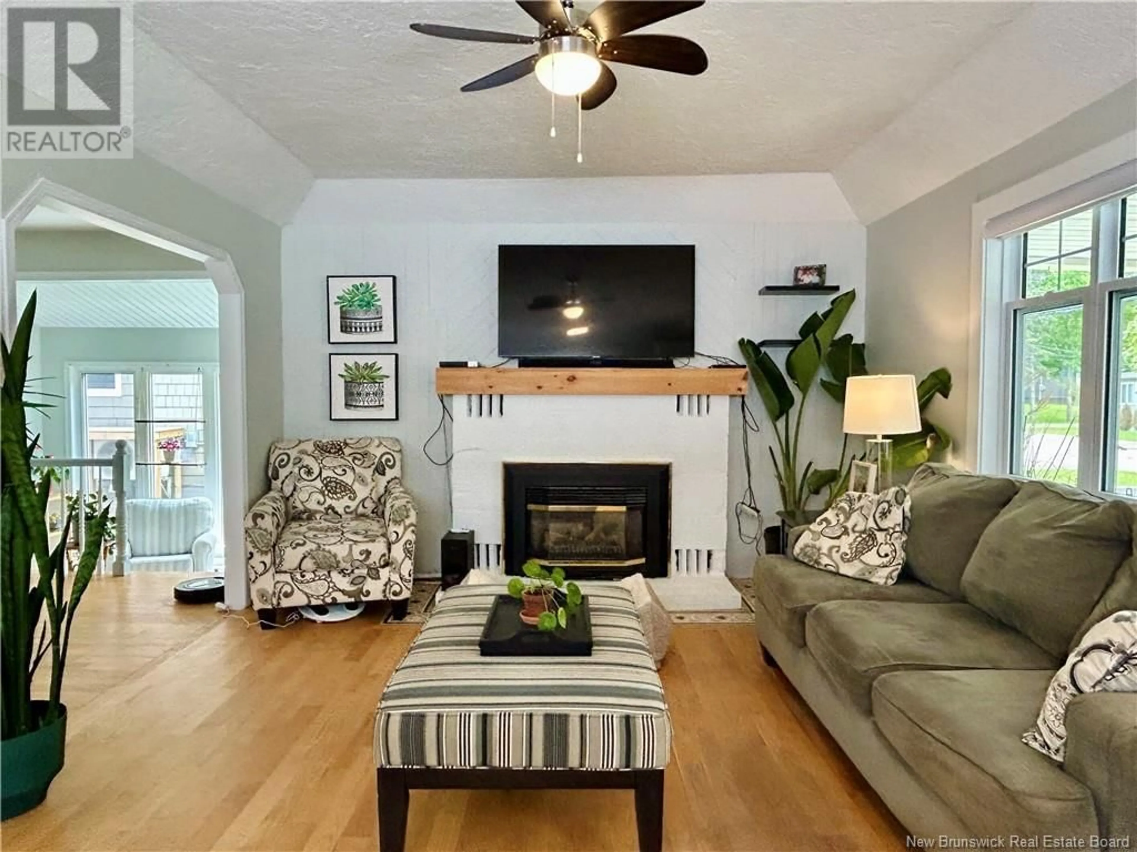 Living room with furniture, wood/laminate floor for 104 GALLAGHER STREET, Shediac New Brunswick E4P1S9
