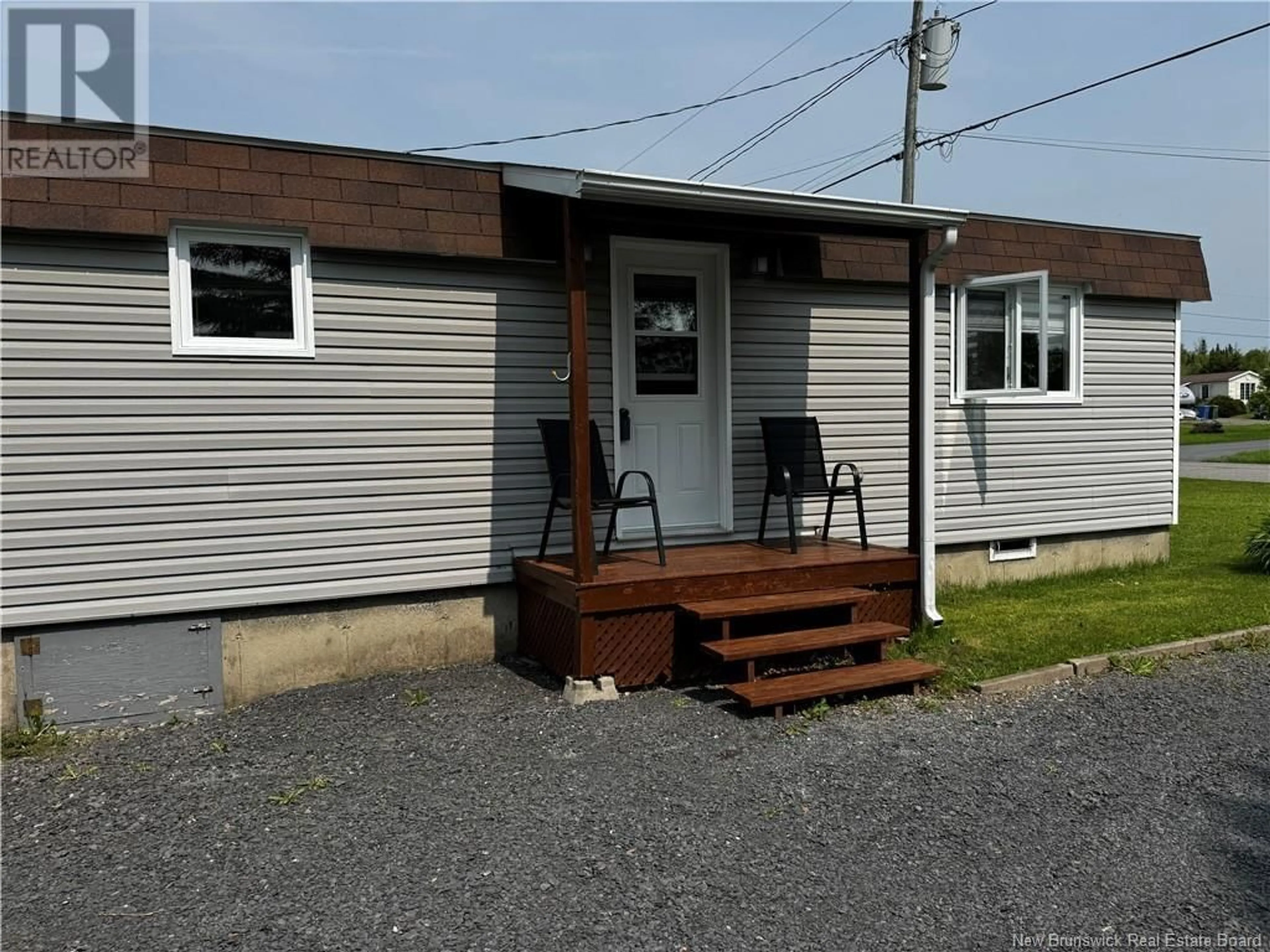 Home with vinyl exterior material, street for 16 LE PARADIS STREET, Saint-Jacques New Brunswick E7B1T5