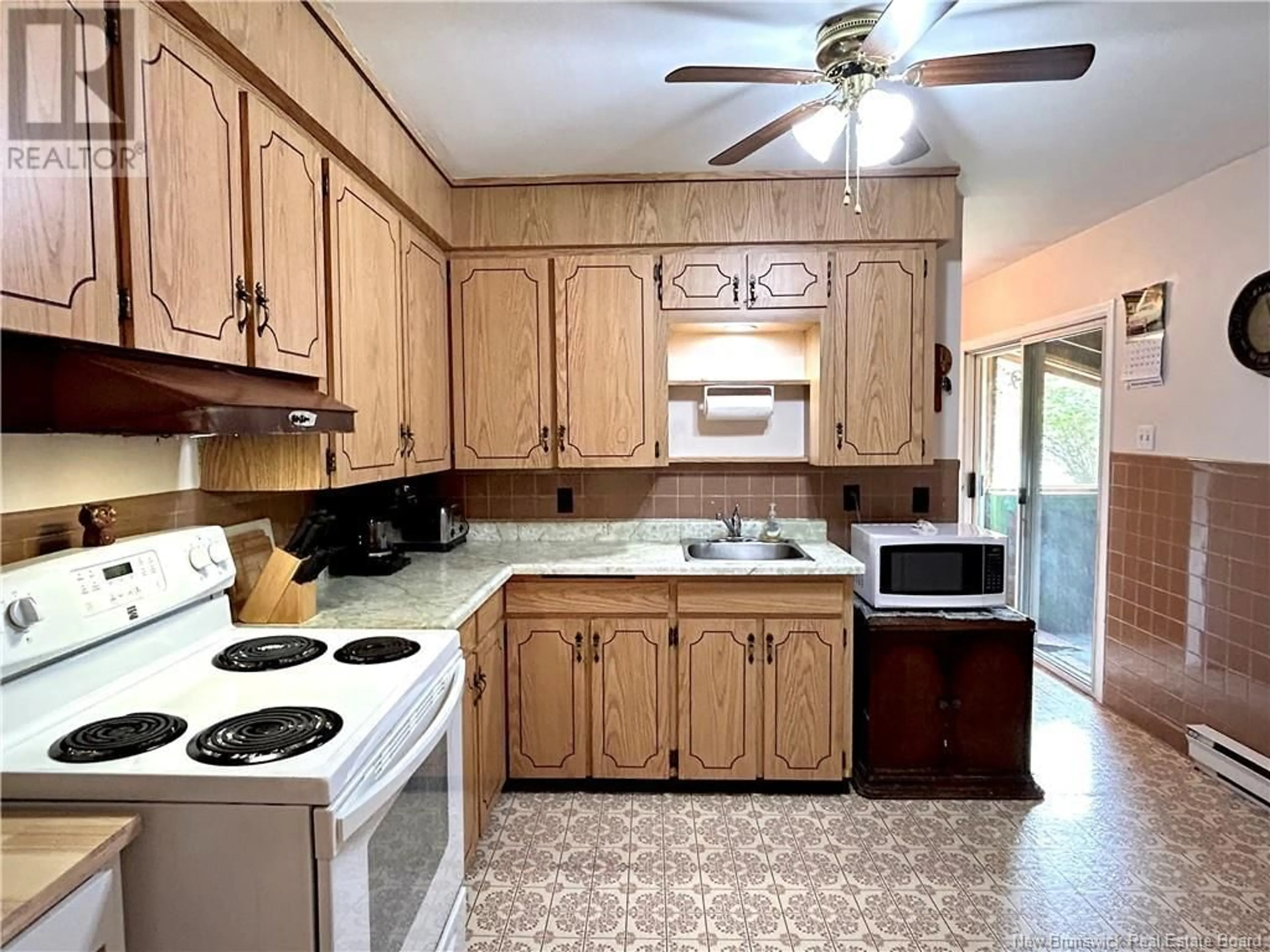 Standard kitchen, ceramic/tile floor for 56 MCINTOSH STREET, Miramichi New Brunswick E1N2B3