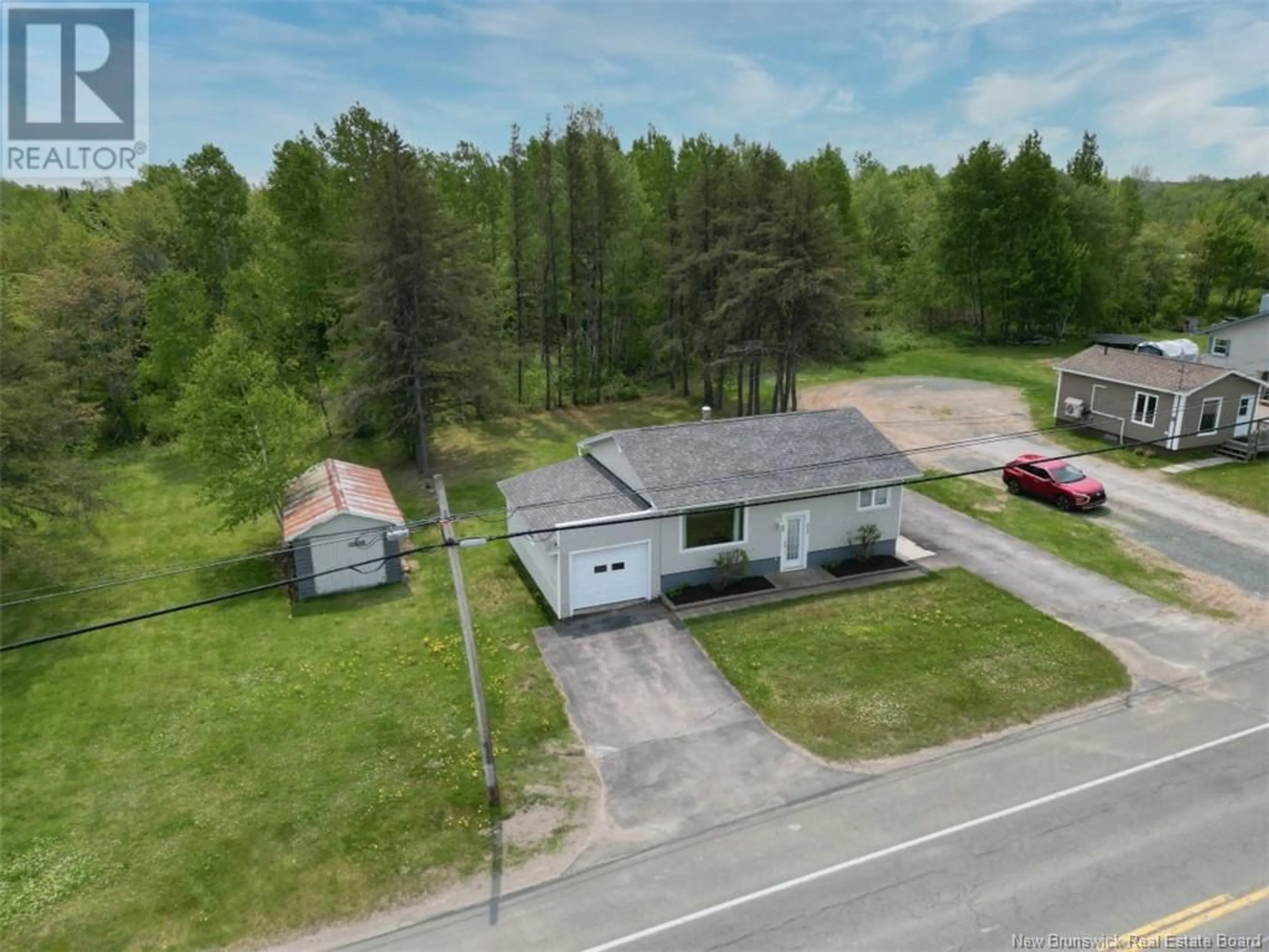A pic from outside/outdoor area/front of a property/back of a property/a pic from drone, street for 332 ROUTE 160, Allardville New Brunswick E8L1J8