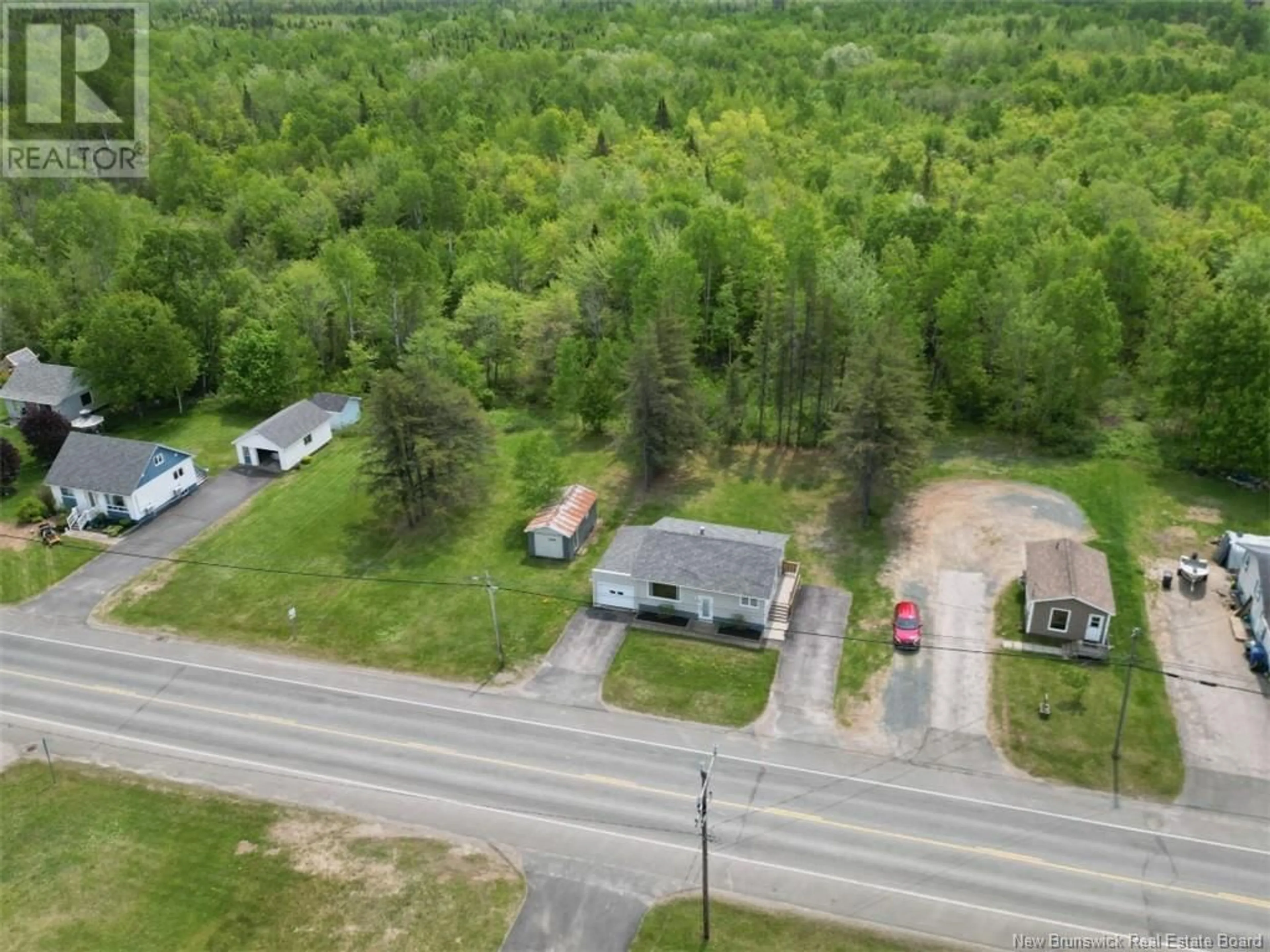 A pic from outside/outdoor area/front of a property/back of a property/a pic from drone, forest/trees view for 332 ROUTE 160, Allardville New Brunswick E8L1J8