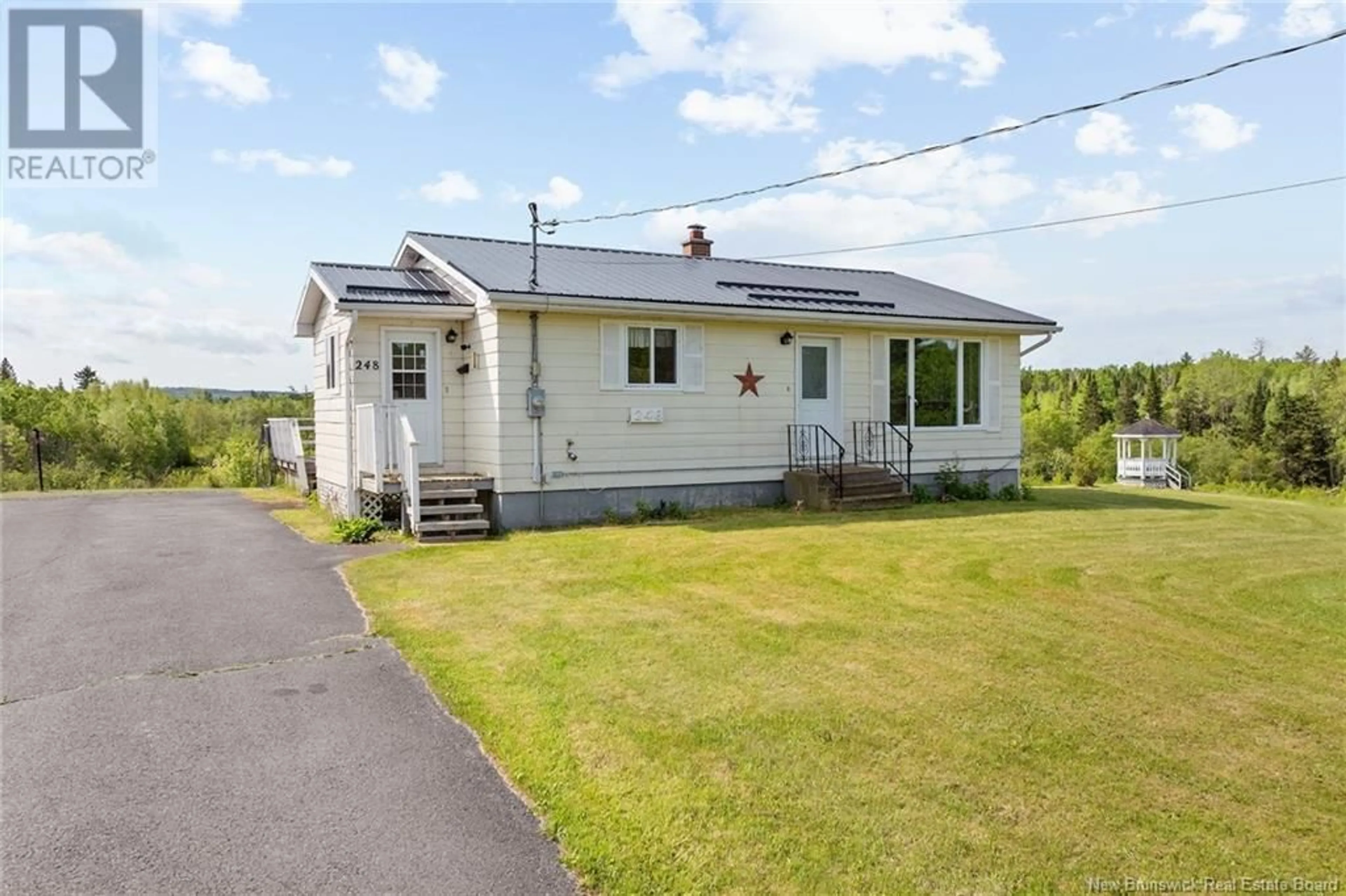 A pic from outside/outdoor area/front of a property/back of a property/a pic from drone, street for 248 ENISKILLEN ROAD, Wirral New Brunswick E5L2M5