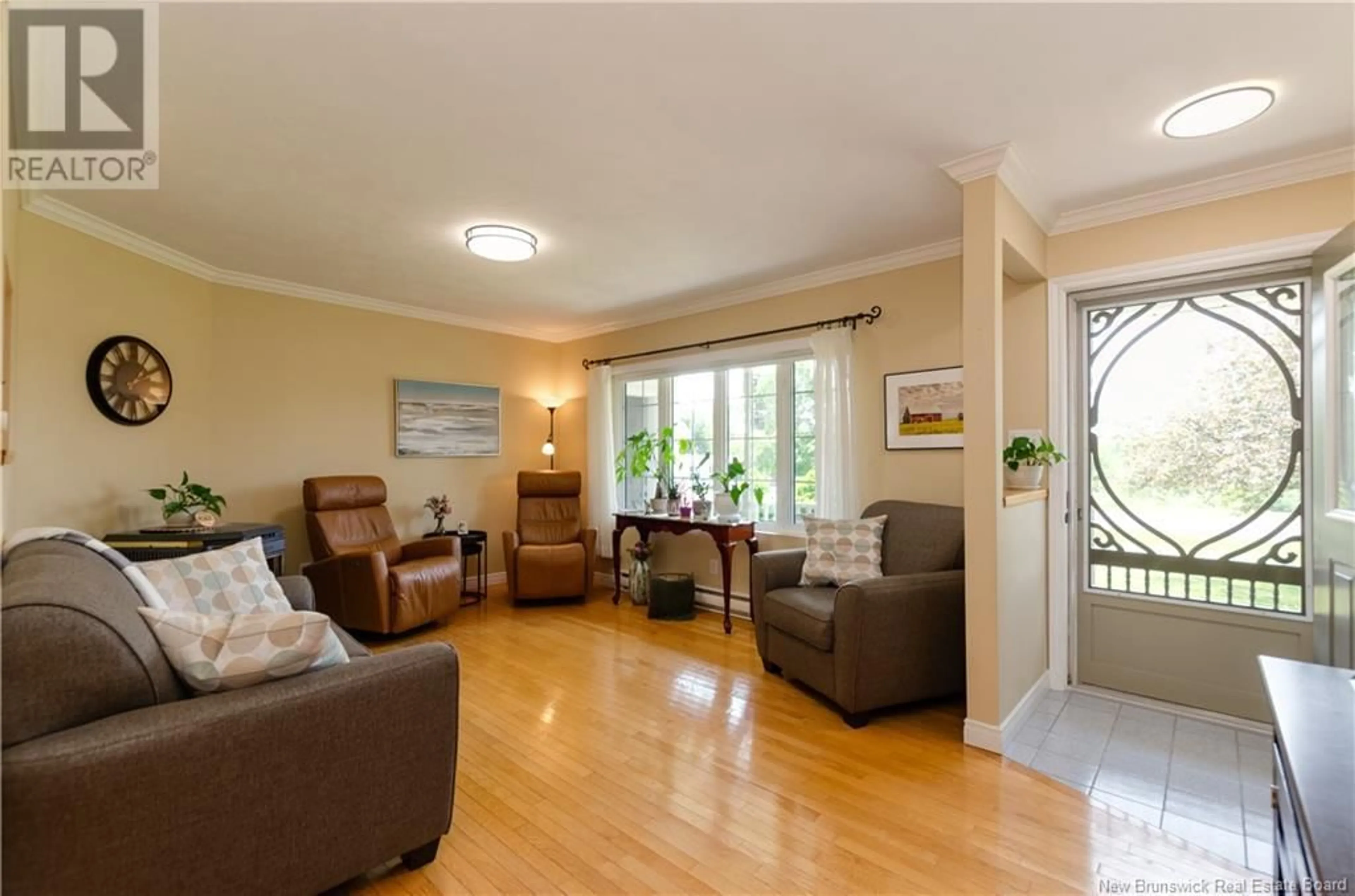 Living room with furniture, wood/laminate floor for 264 MOLLINS ROAD, Colpitts Settlement New Brunswick E4J2X4
