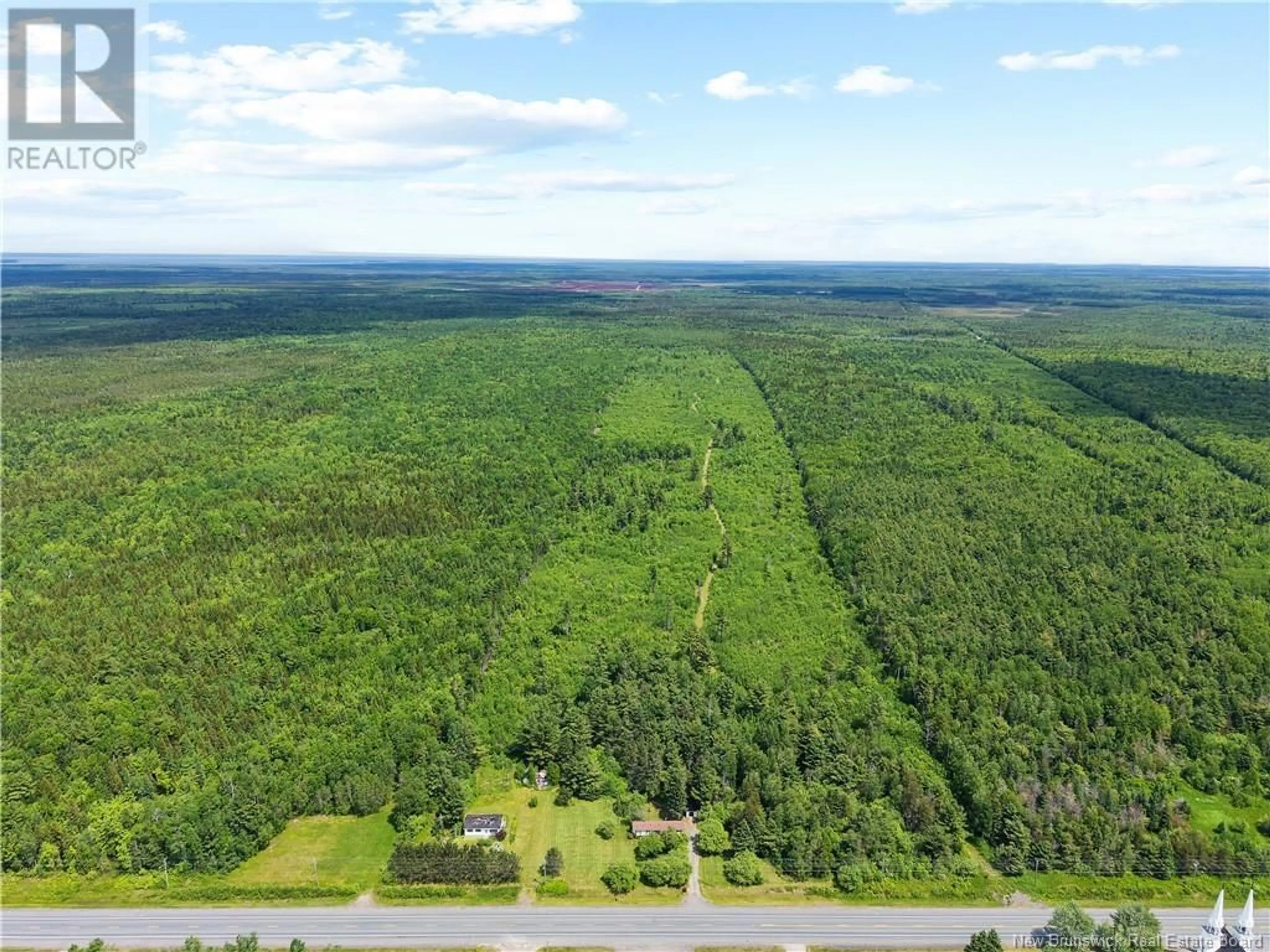 A pic from outside/outdoor area/front of a property/back of a property/a pic from drone, forest/trees view for 9386 11 ROUTE ROUTE, Saint Margarets New Brunswick E1N5C5