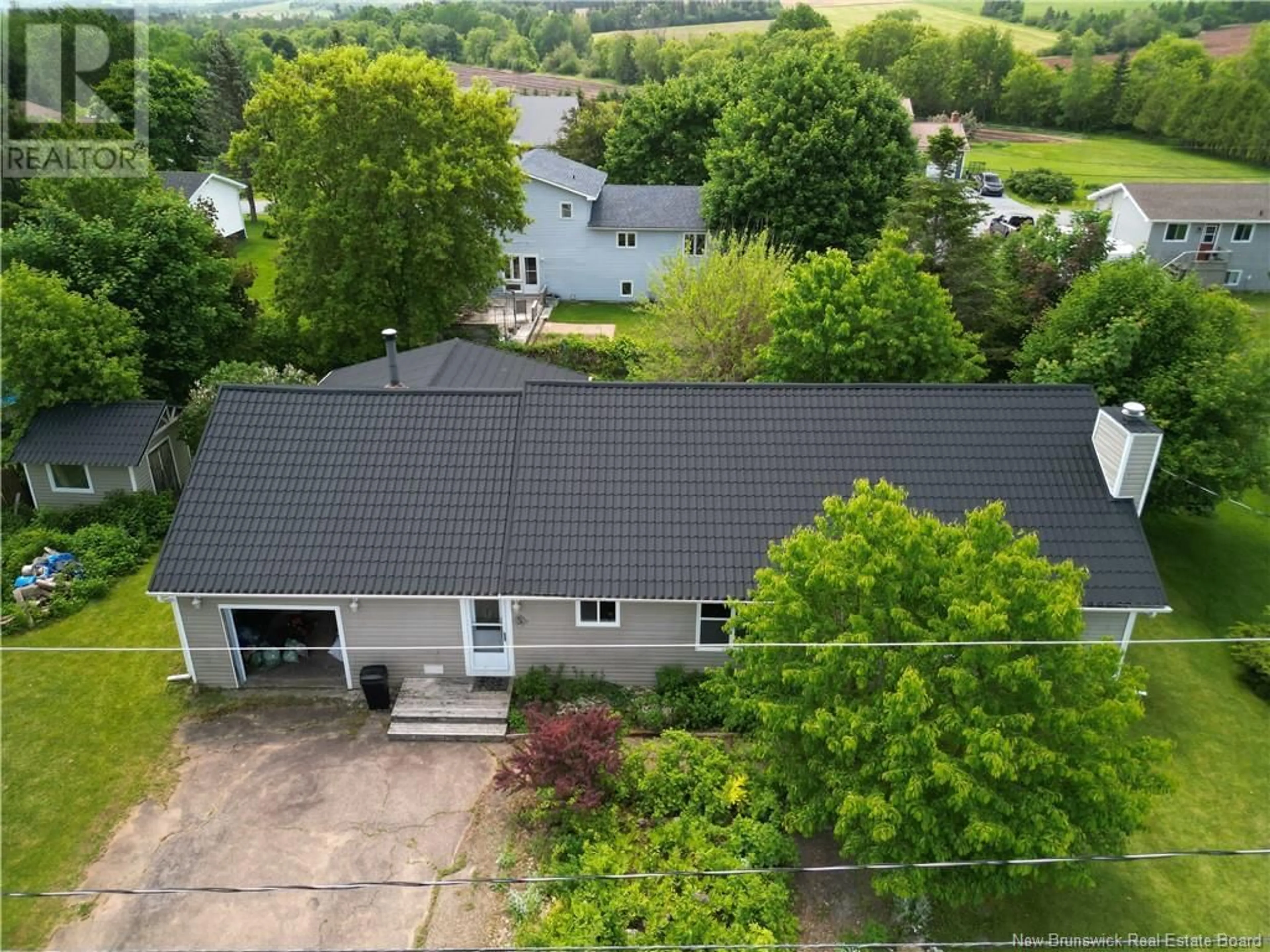 A pic from outside/outdoor area/front of a property/back of a property/a pic from drone, water/lake/river/ocean view for 5 PHILLIPS STREET, Sussex Corner New Brunswick E4E3B9