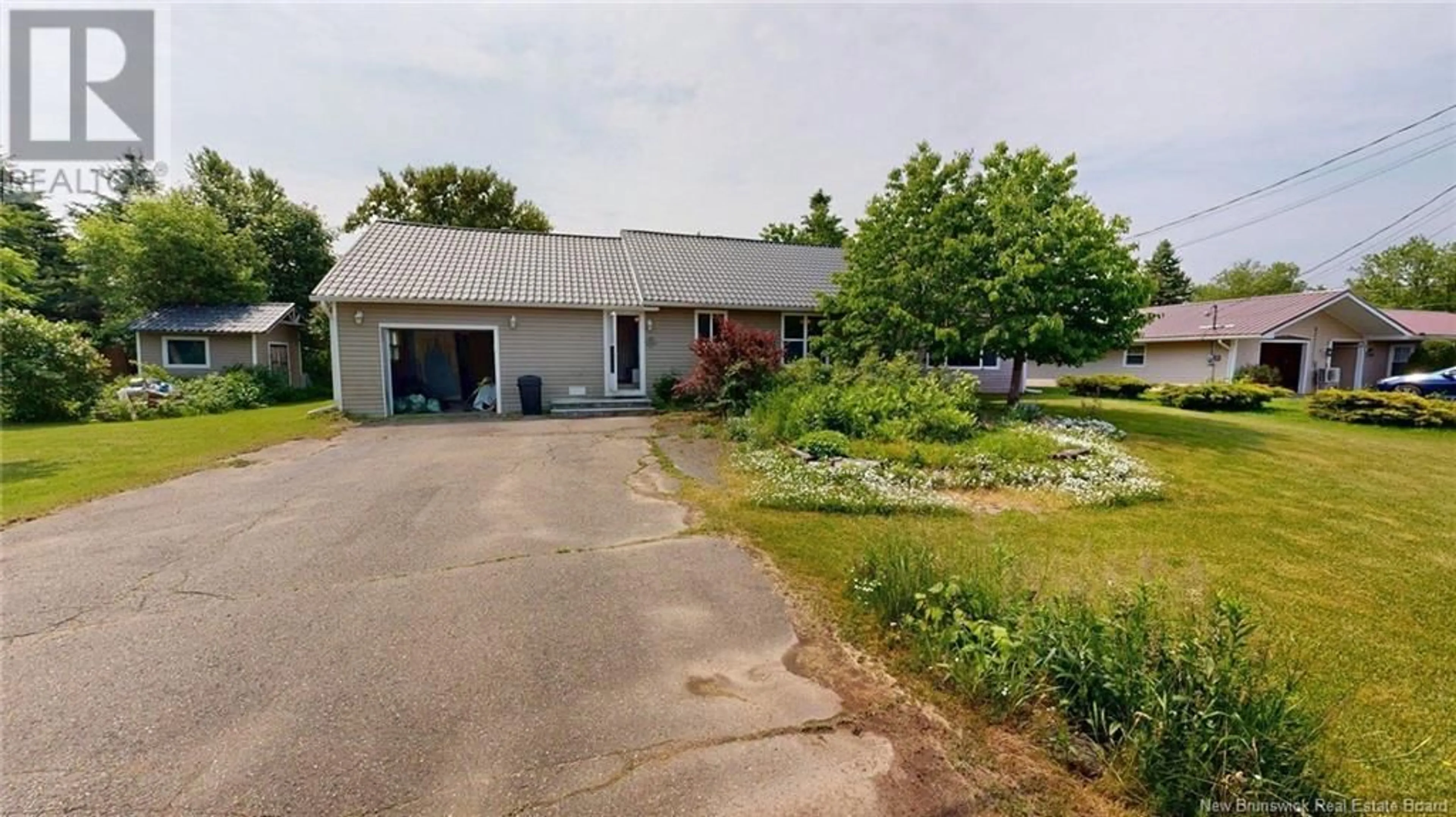 A pic from outside/outdoor area/front of a property/back of a property/a pic from drone, unknown for 5 PHILLIPS STREET, Sussex Corner New Brunswick E4E3B9