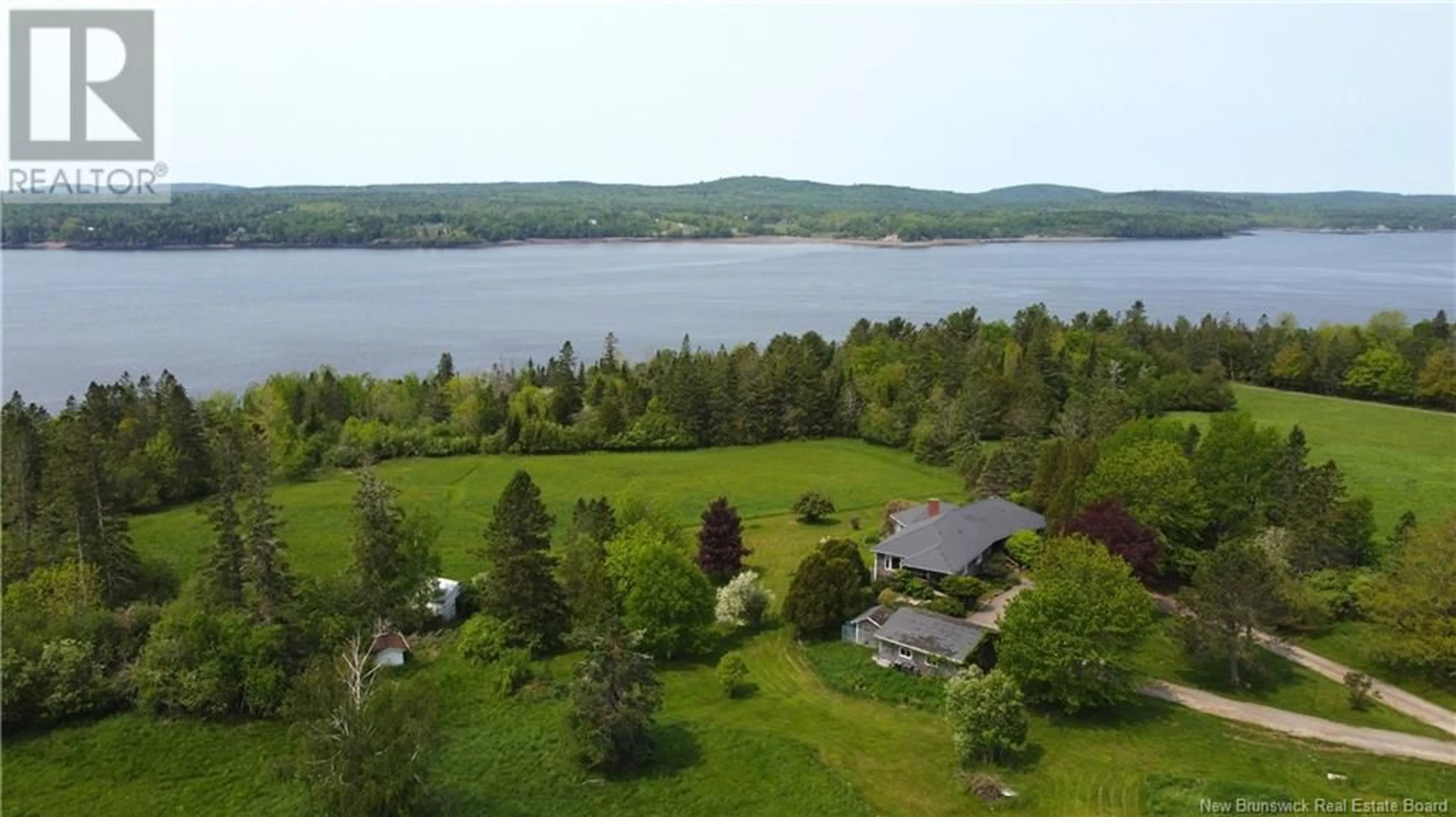 A pic from outside/outdoor area/front of a property/back of a property/a pic from drone, water/lake/river/ocean view for 92 BANTRY BAY FARM ROAD, Bayside New Brunswick E5B2V9