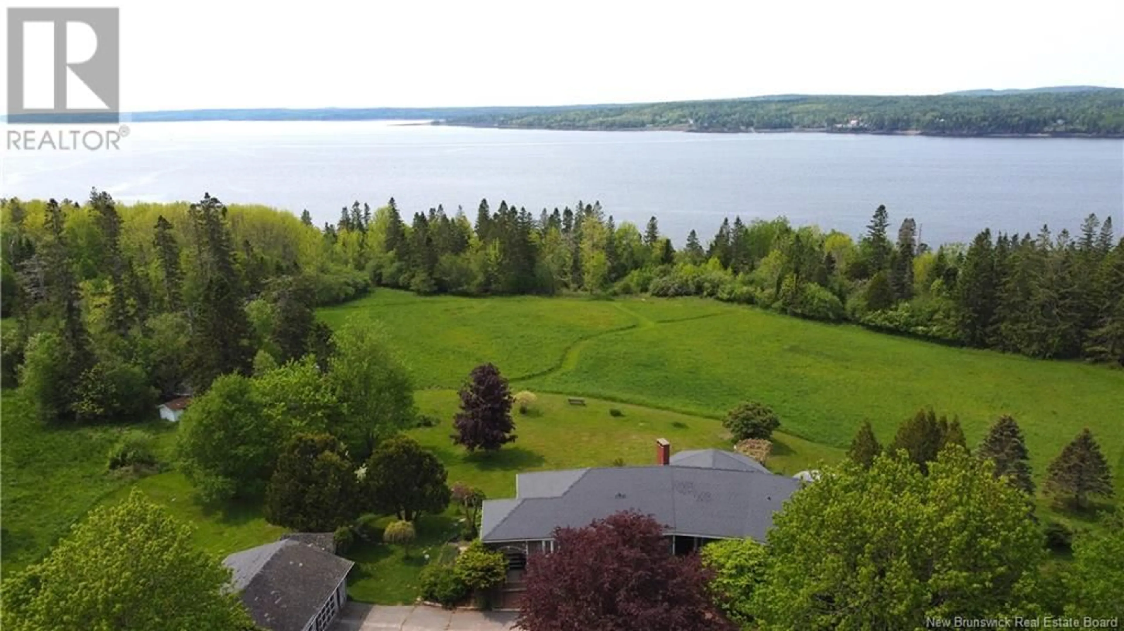 A pic from outside/outdoor area/front of a property/back of a property/a pic from drone, water/lake/river/ocean view for 92 BANTRY BAY FARM ROAD, Bayside New Brunswick E5B2V9