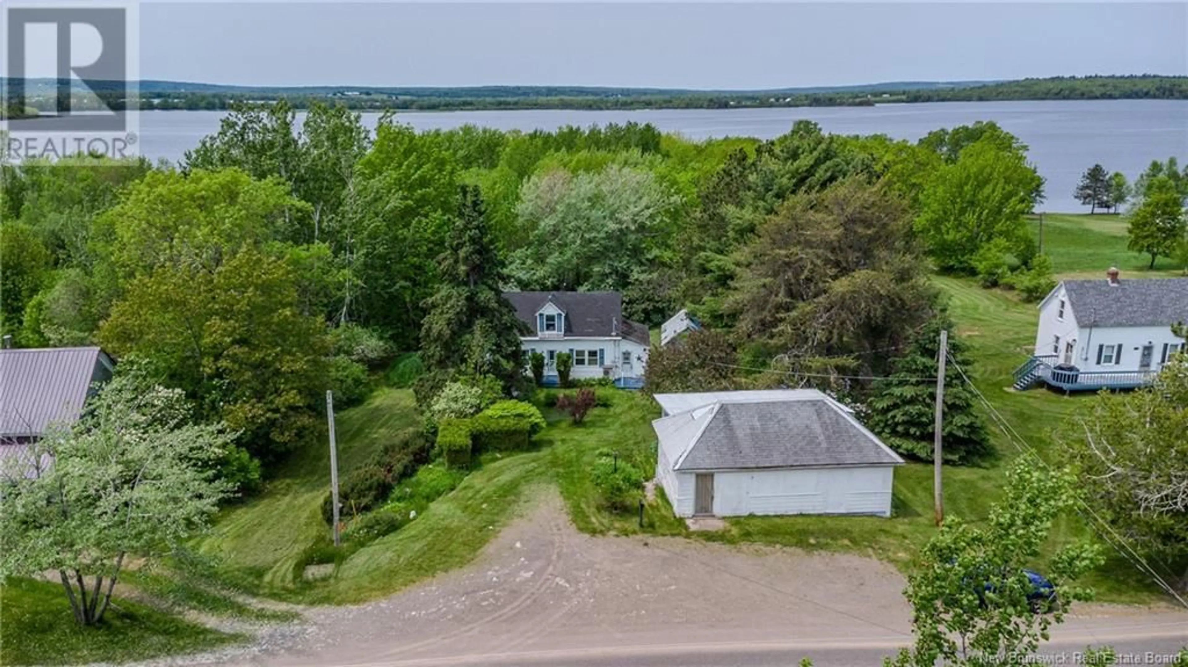 A pic from outside/outdoor area/front of a property/back of a property/a pic from drone, water/lake/river/ocean view for 2059 705 ROUTE, Wickham New Brunswick E5T3R8