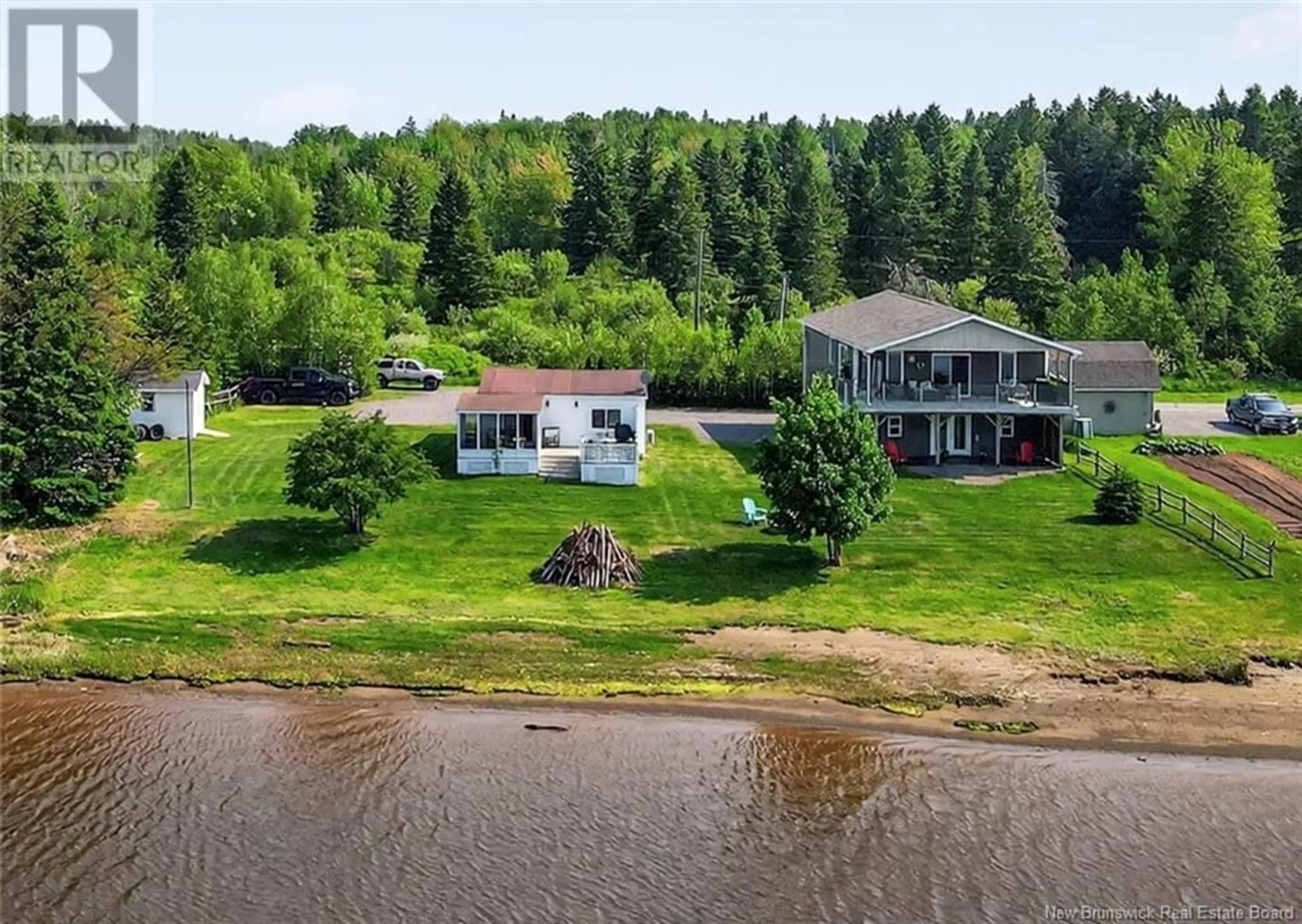 A pic from outside/outdoor area/front of a property/back of a property/a pic from drone, water/lake/river/ocean view for 3 ALINE AVENUE, Shediac Cape New Brunswick E4P2Y4