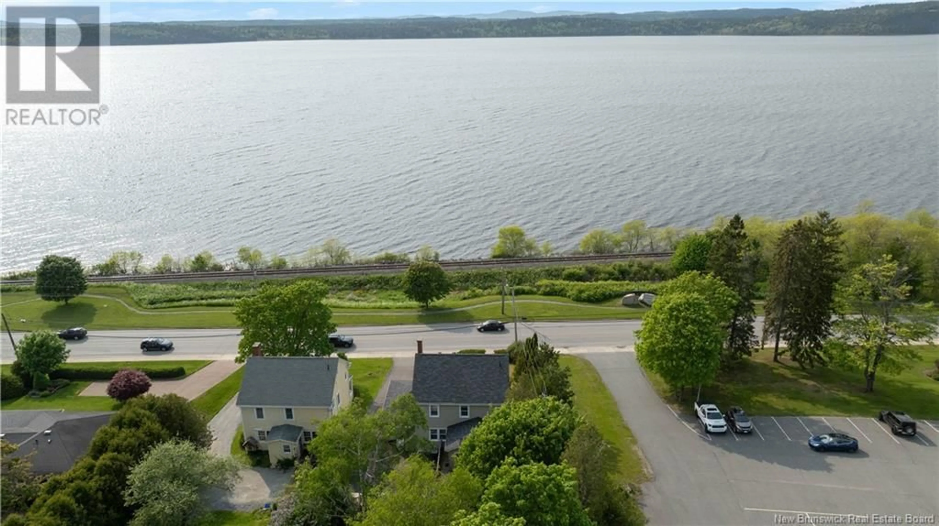 A pic from outside/outdoor area/front of a property/back of a property/a pic from drone, water/lake/river/ocean view for 2478 ROTHESAY ROAD, Rothesay New Brunswick E2H2K7