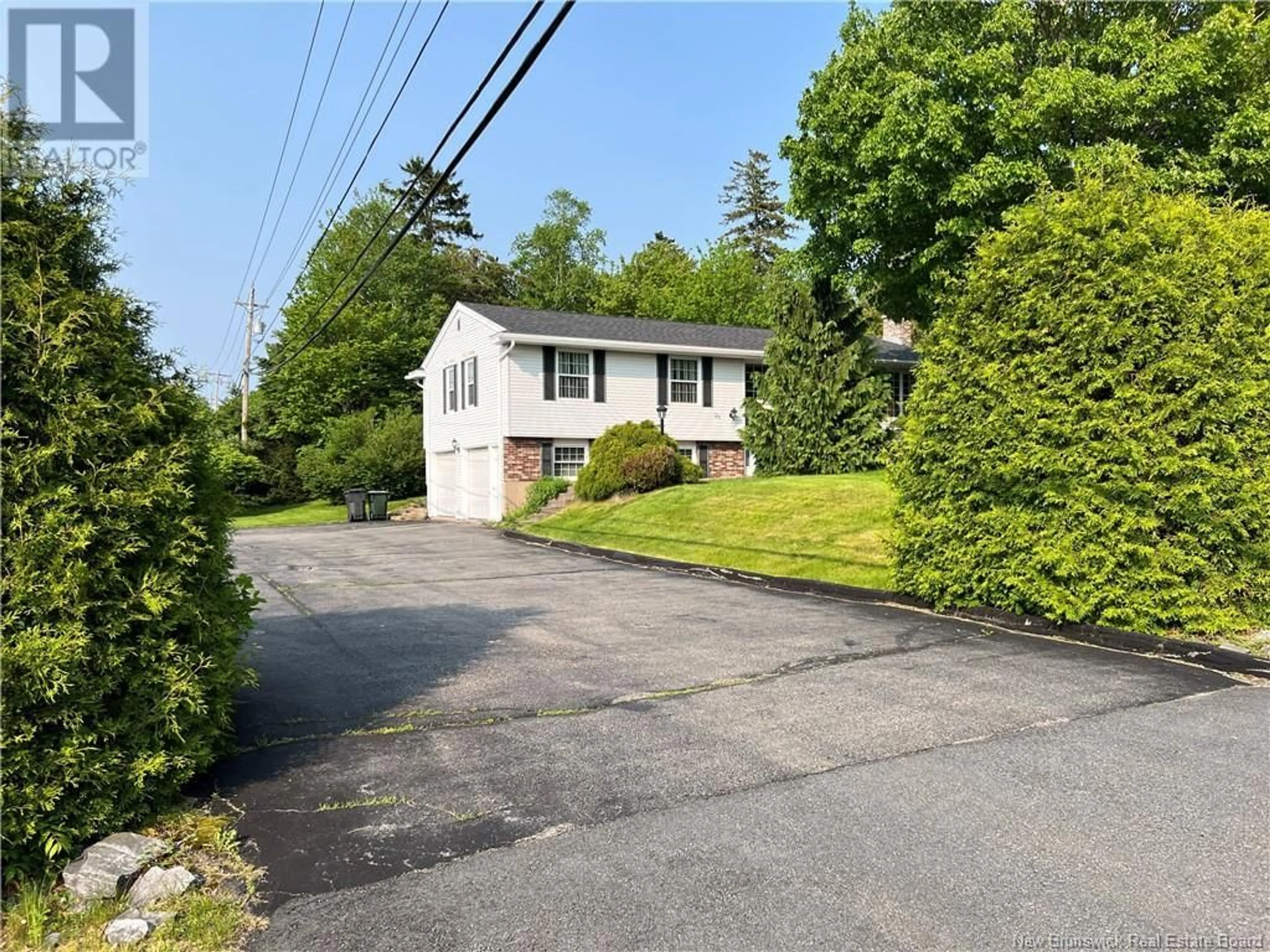 A pic from outside/outdoor area/front of a property/back of a property/a pic from drone, street for 25 DONLYN DRIVE, Quispamsis New Brunswick E2E4H3