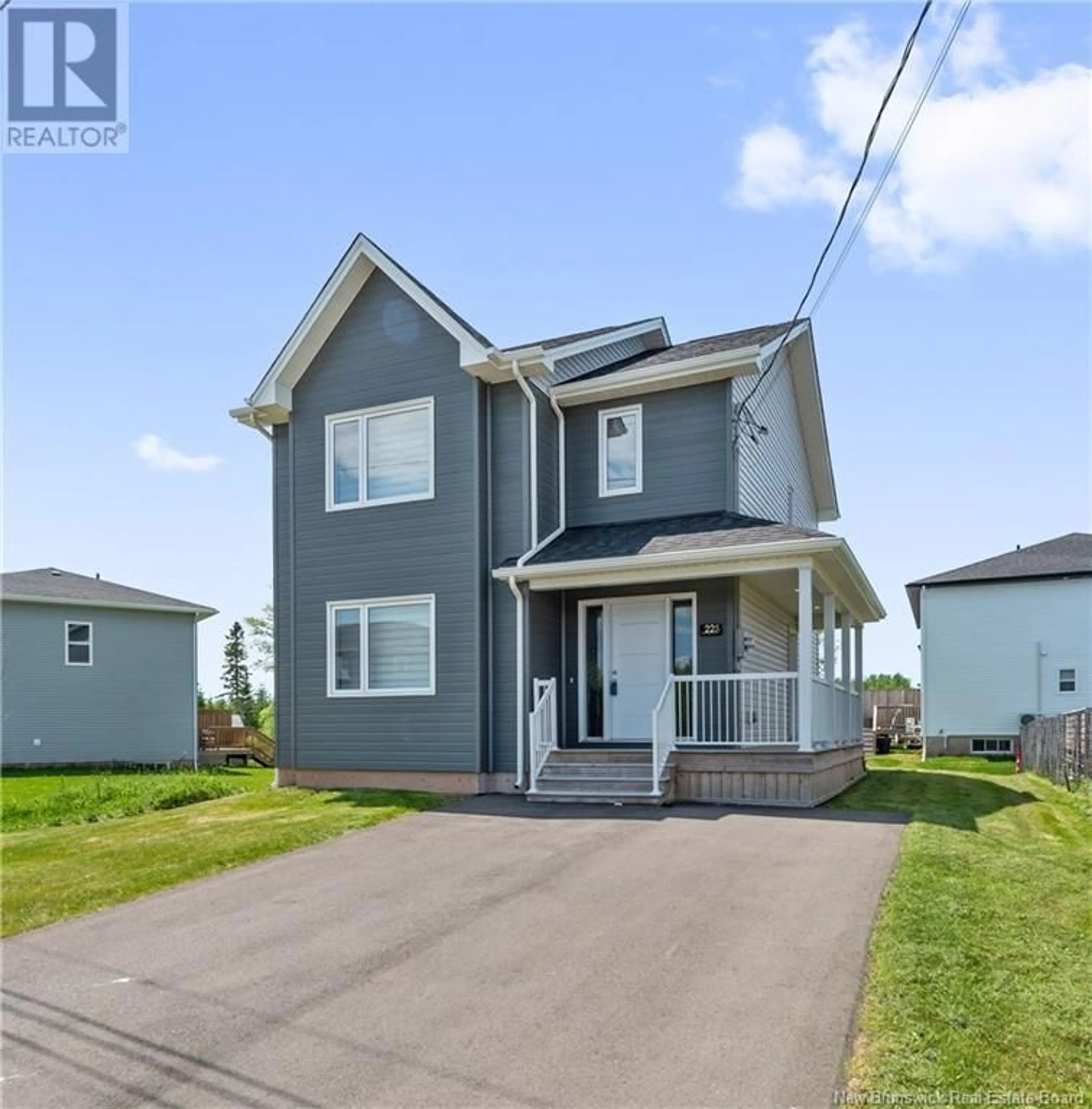 Home with vinyl exterior material, street for 225 FALCON DRIVE, Moncton New Brunswick E1G6H3