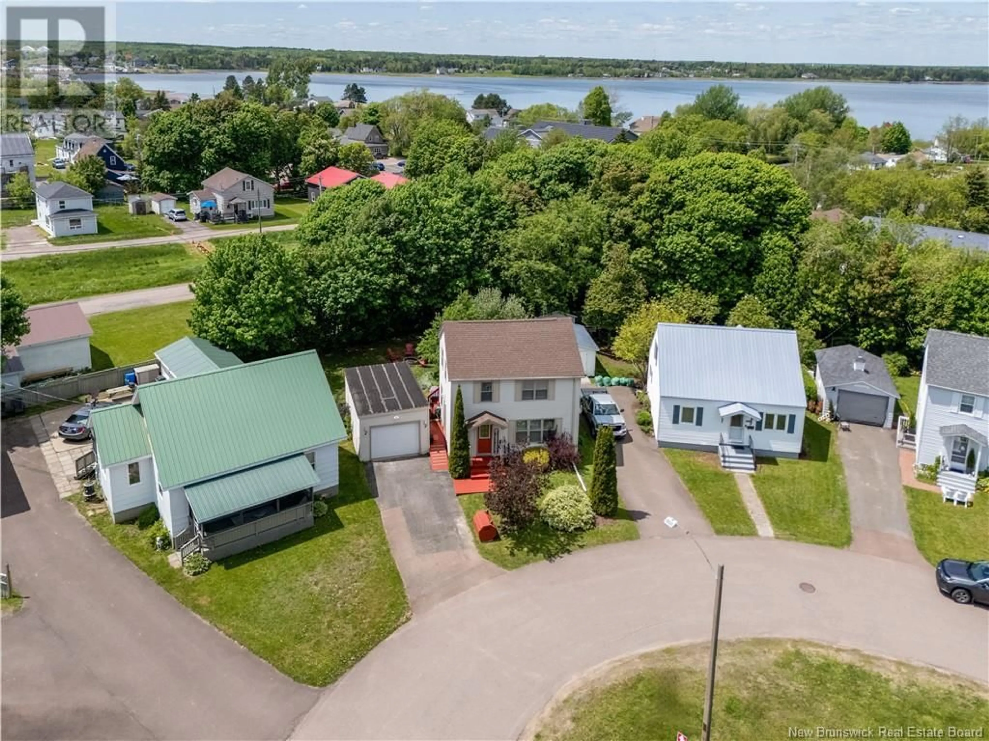 A pic from outside/outdoor area/front of a property/back of a property/a pic from drone, water/lake/river/ocean view for 228 BAYVIEW COURT, Shediac New Brunswick E4P1G3