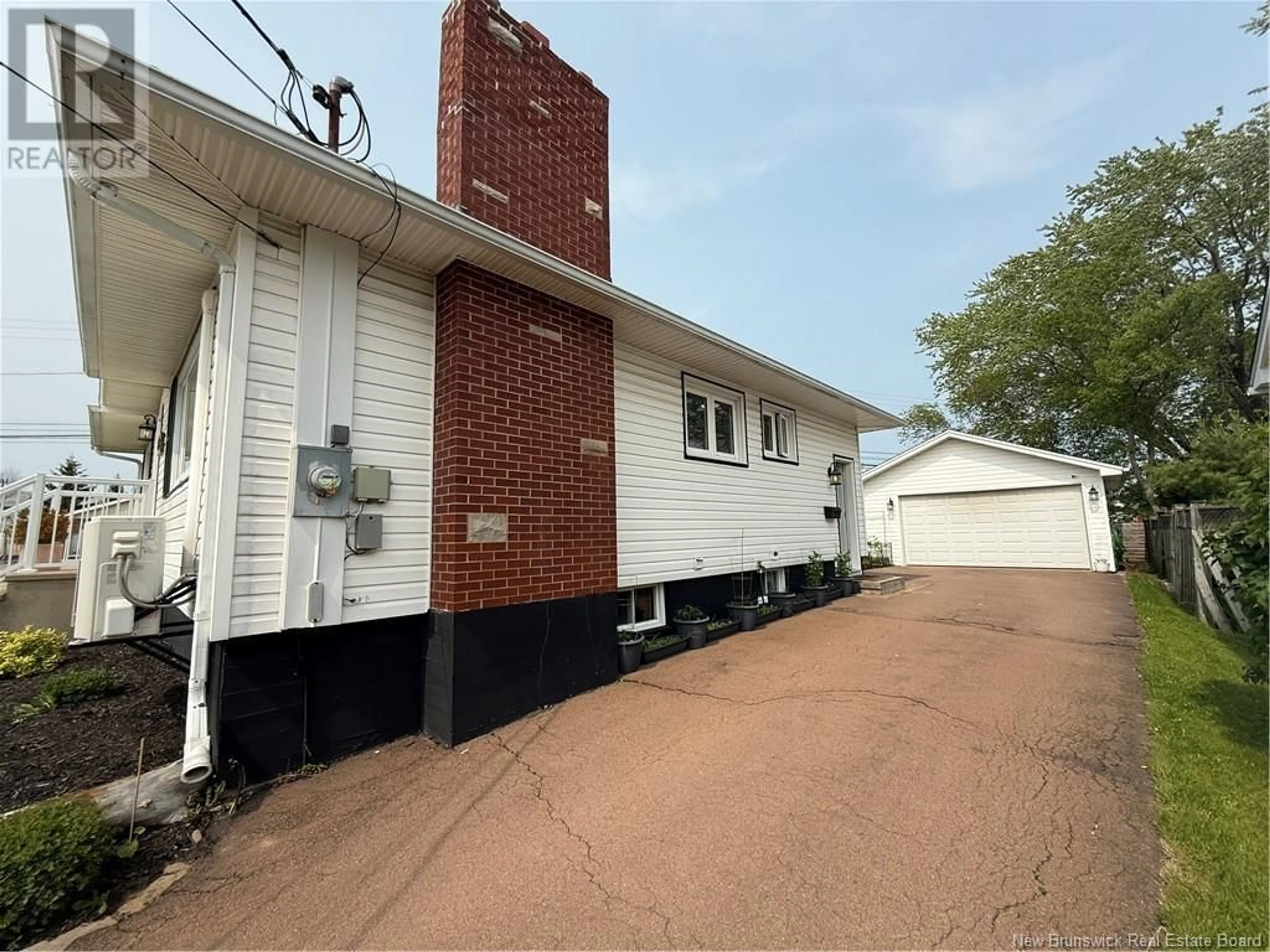 Home with vinyl exterior material, street for 85 NINTH STREET, Moncton New Brunswick E1E3E5