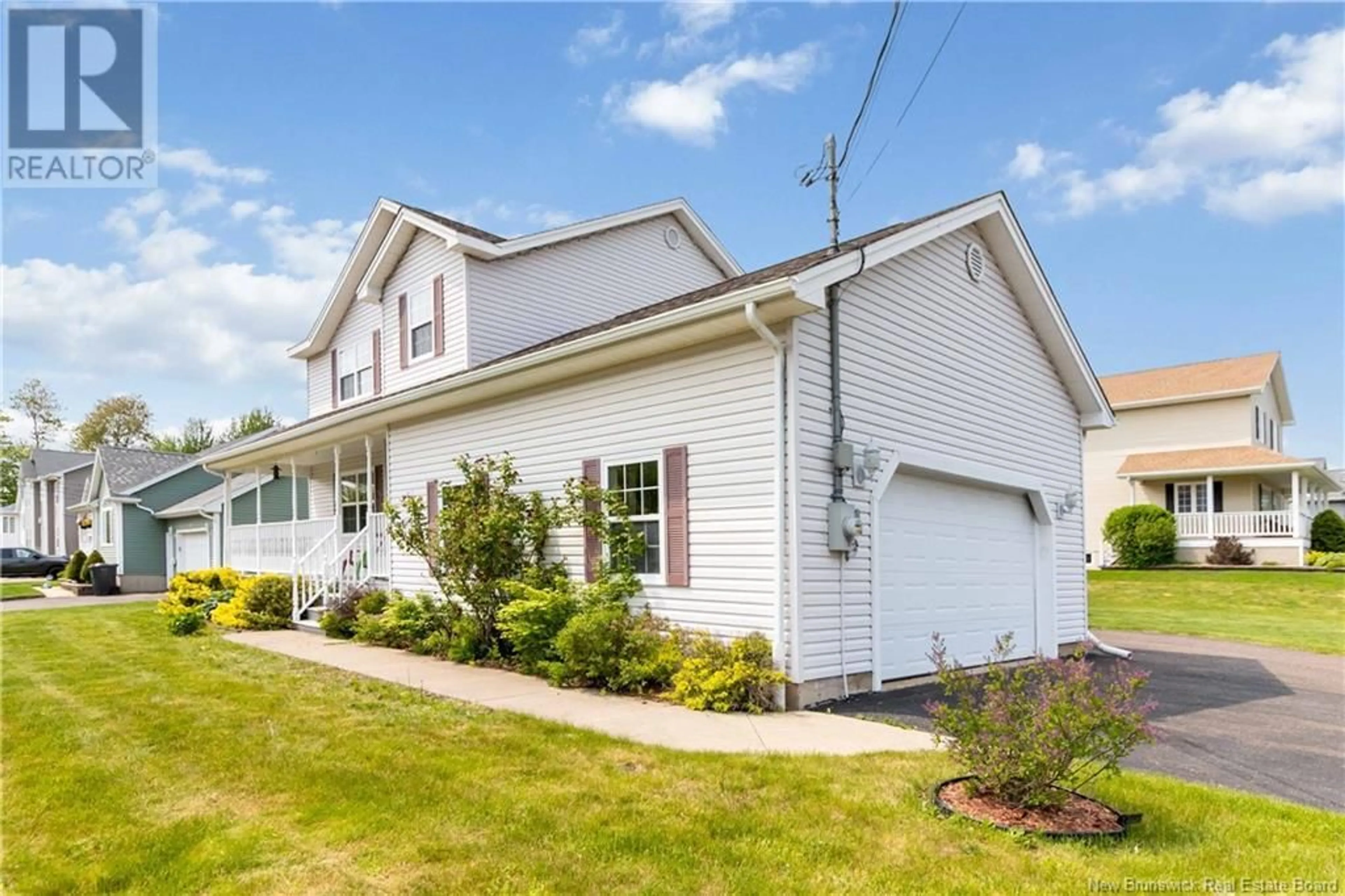 Home with vinyl exterior material, street for 33 MAGNOLIA, Moncton New Brunswick E1A8C6